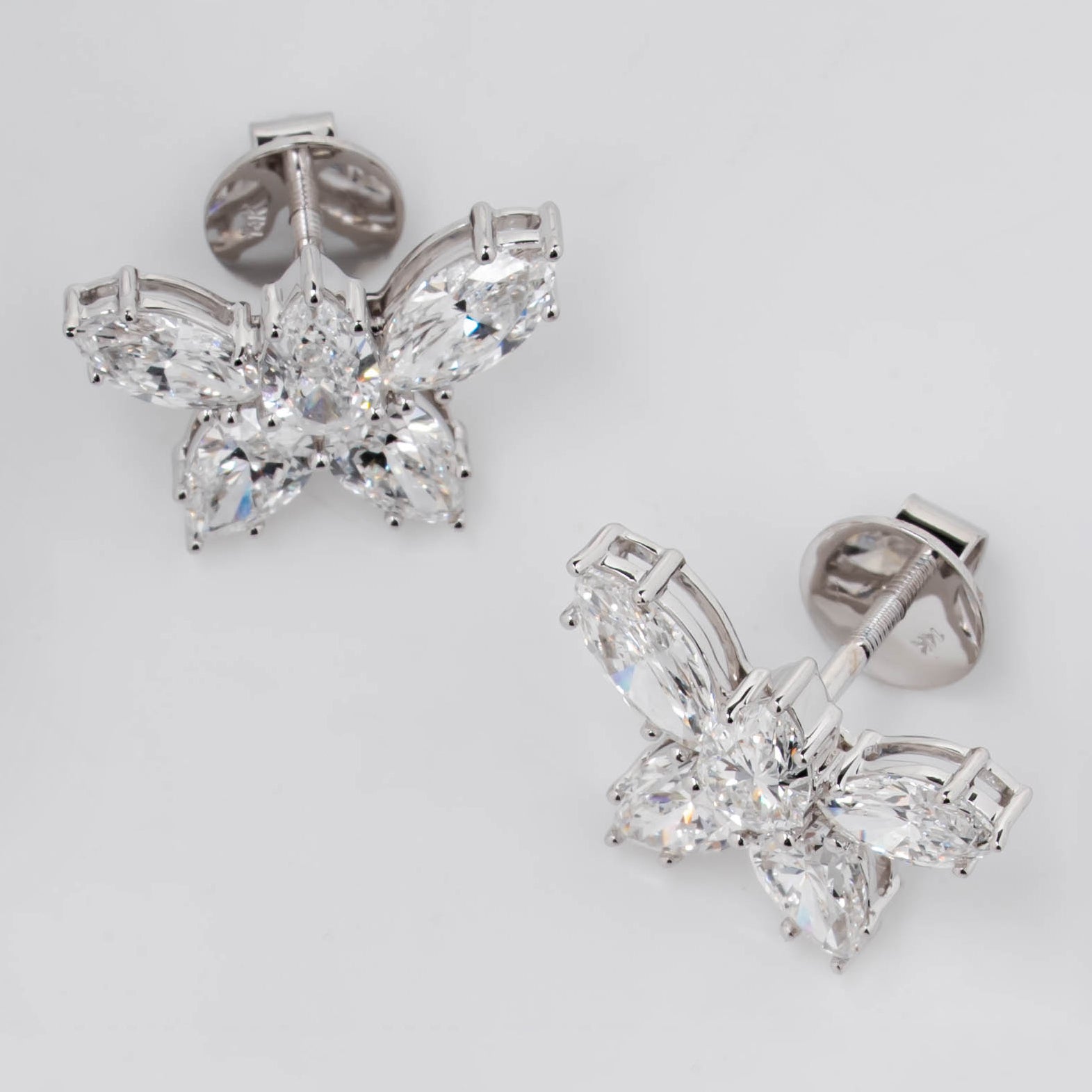 STUD EARRING FEATURING MARQUISE CUT SOLITAIRE DIAMOND IN GOLD