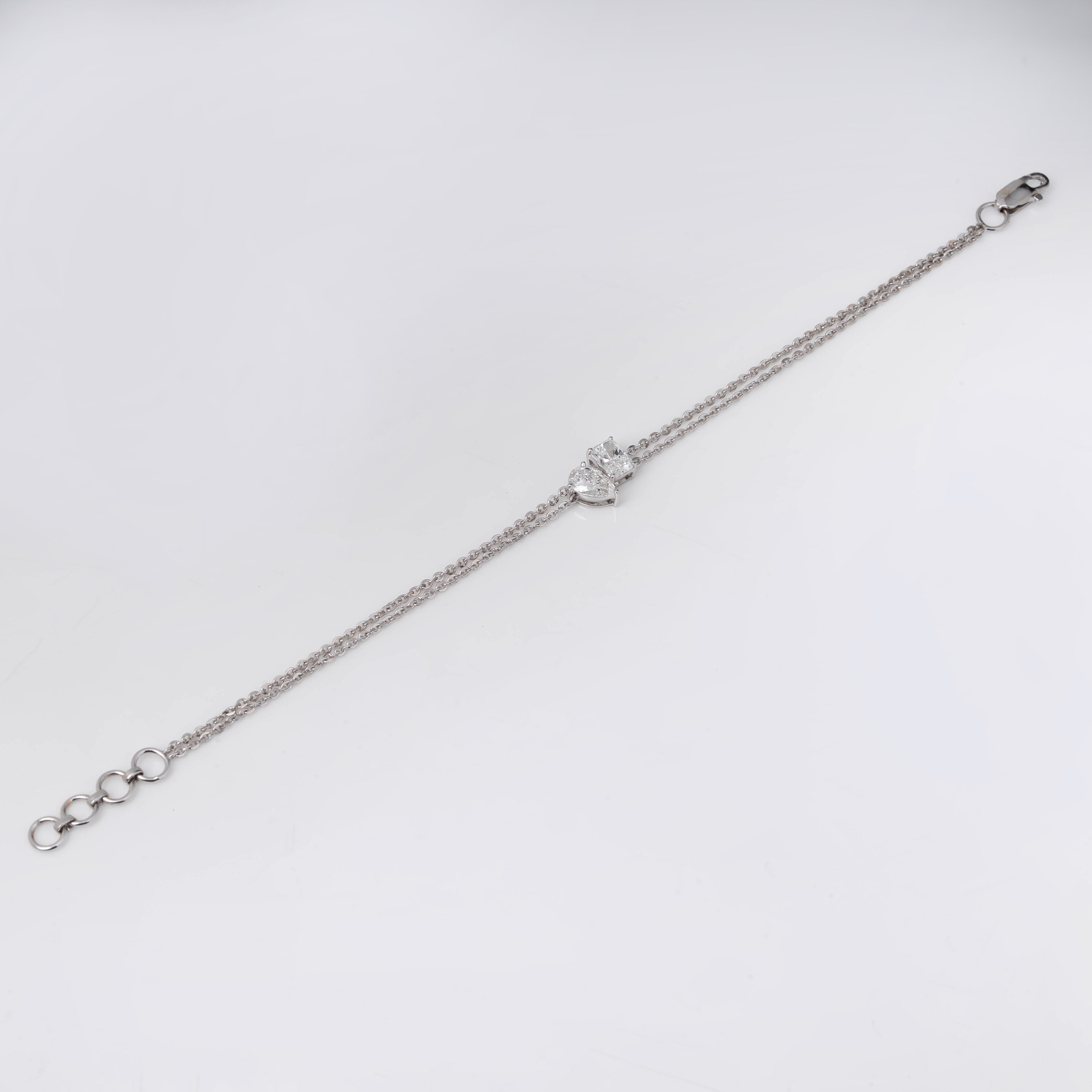 STUNNING PEAR WITH ROUND SOLITAIRE DIAMOND DELICATE DOUBLE-STRAND BRACELET