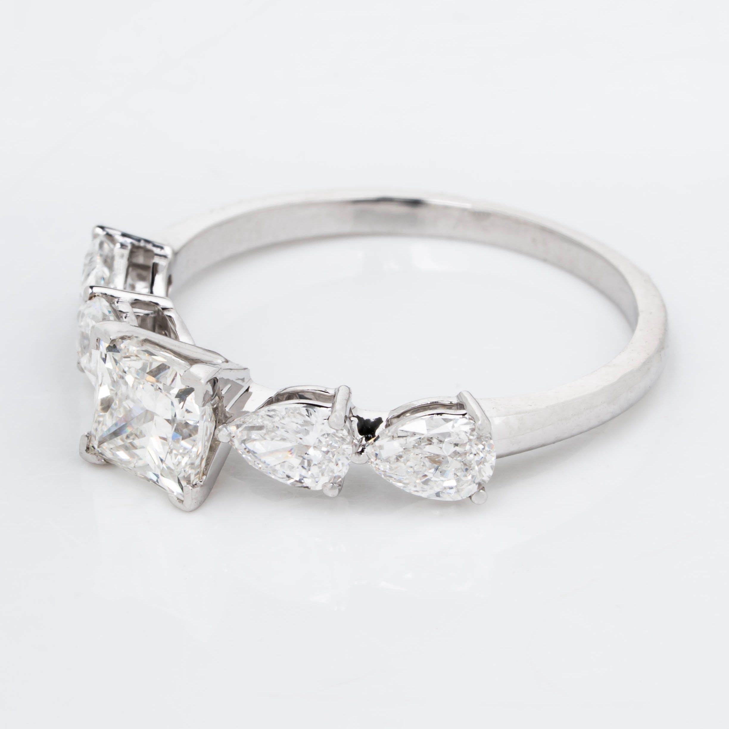 PRINCESS CROWN RING EMBRACED BY PEAR CUT SOLITAIRE LAB GROWN DIAMOND