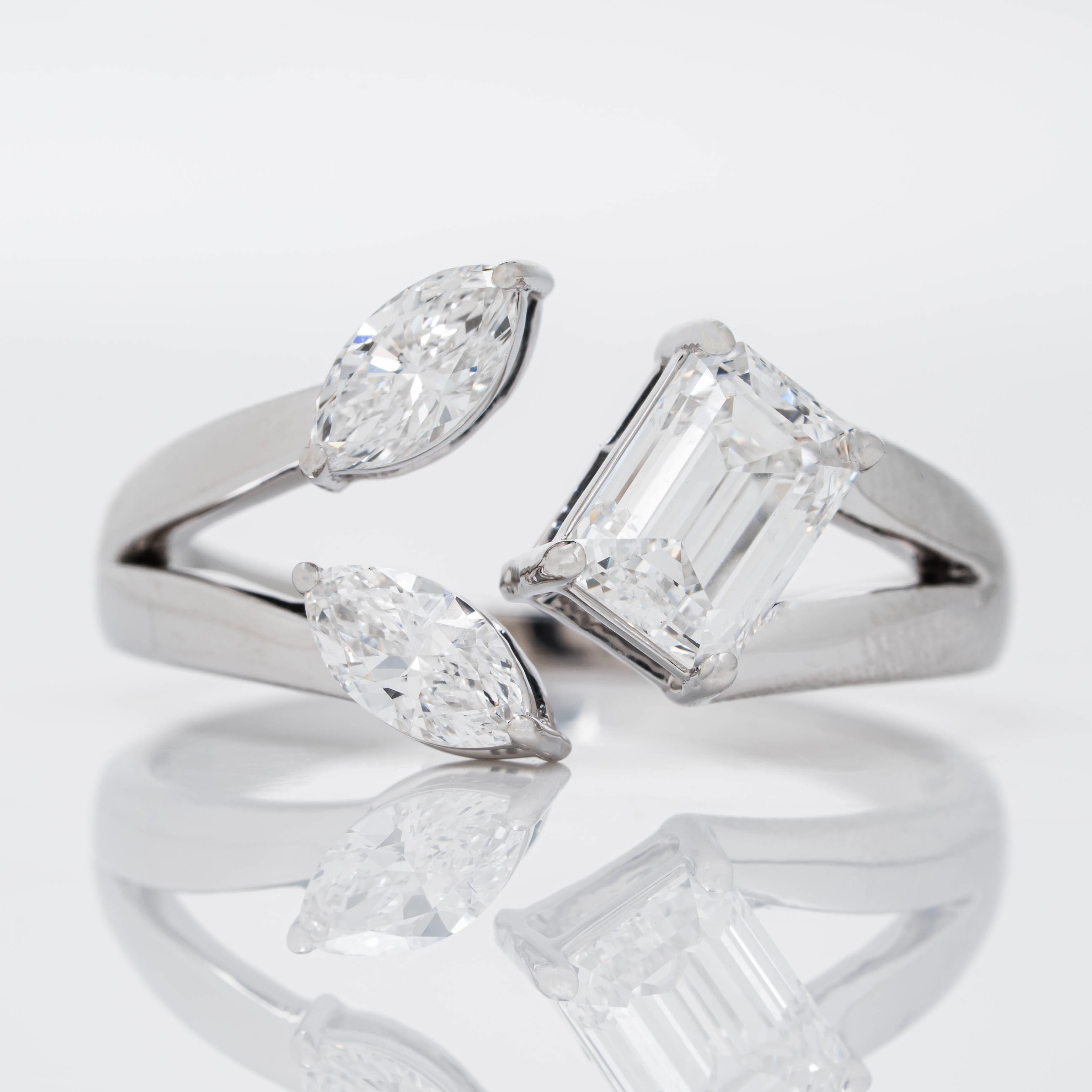 FLORAL RING SHOWCASING PERFECT EMERALD & MARQUISE CUT SOLITAIRE LAB GROWN DIAMOND