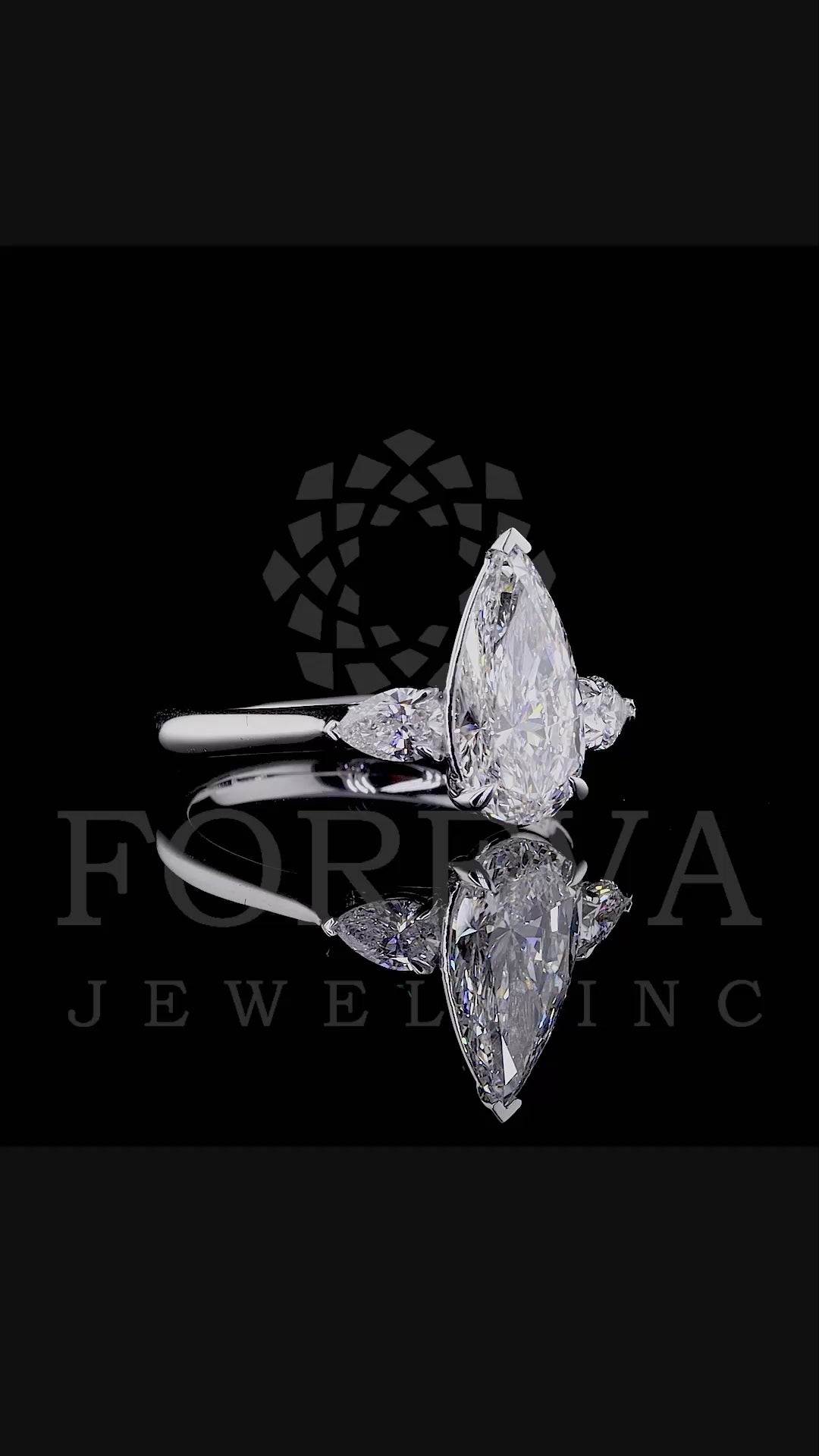 ELONGATED UNIQUE PEAR CUT SOLITAIRE LAB GROWN DIAMOND ENGAGEMENT RING WITH PEAR DIAMOND