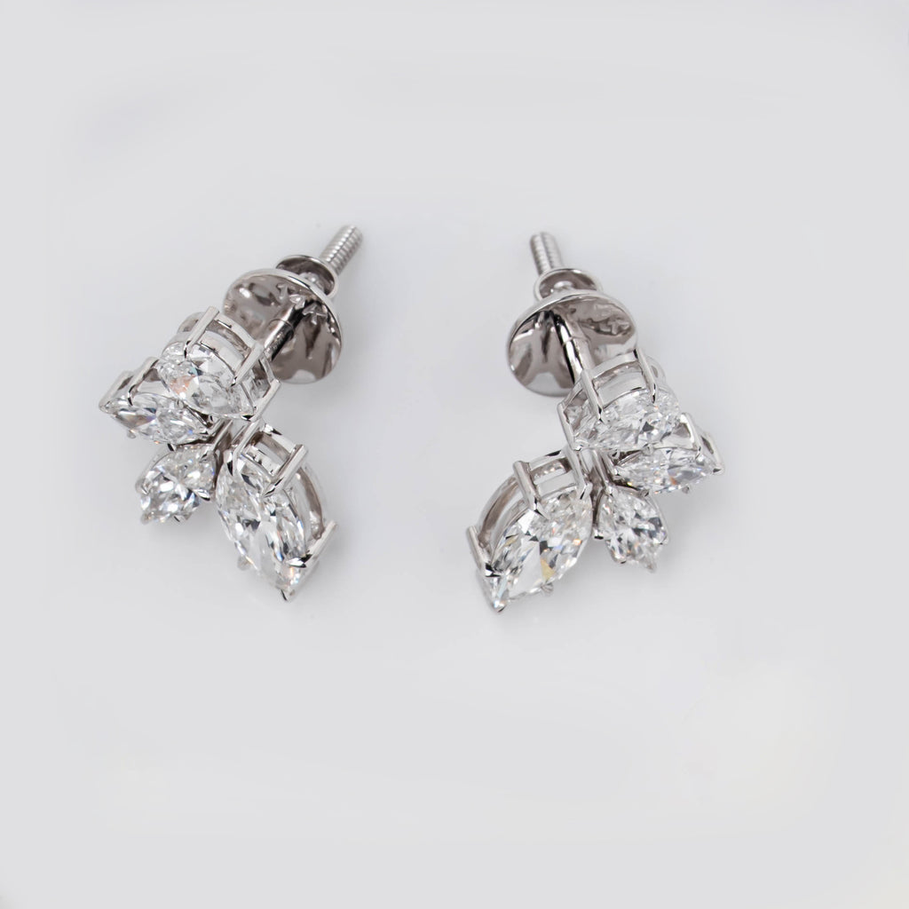 CLUSTER STUD EARRINGS WITH COMBINATION OF MARQUISE AND PEAR CUT SOLITAIRE DIAMOND  IN GOLD