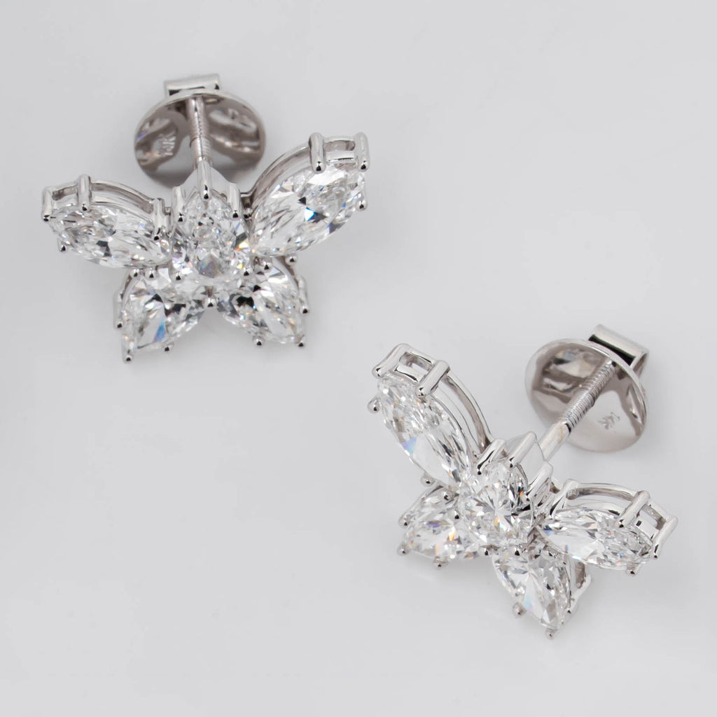 STUD EARRING FEATURING MARQUISE CUT SOLITAIRE DIAMOND IN GOLD