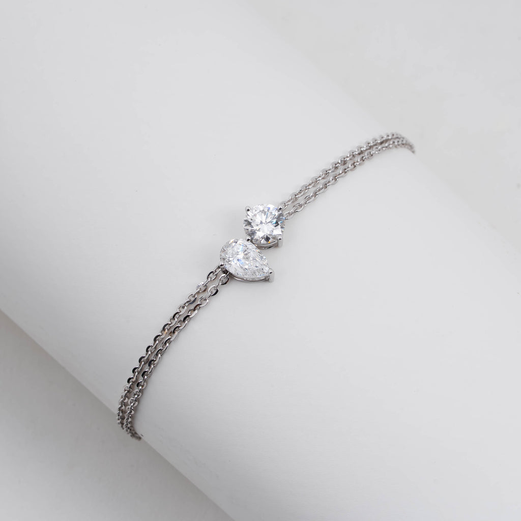 STUNNING PEAR WITH ROUND SOLITAIRE DIAMOND DELICATE DOUBLE-STRAND BRACELET
