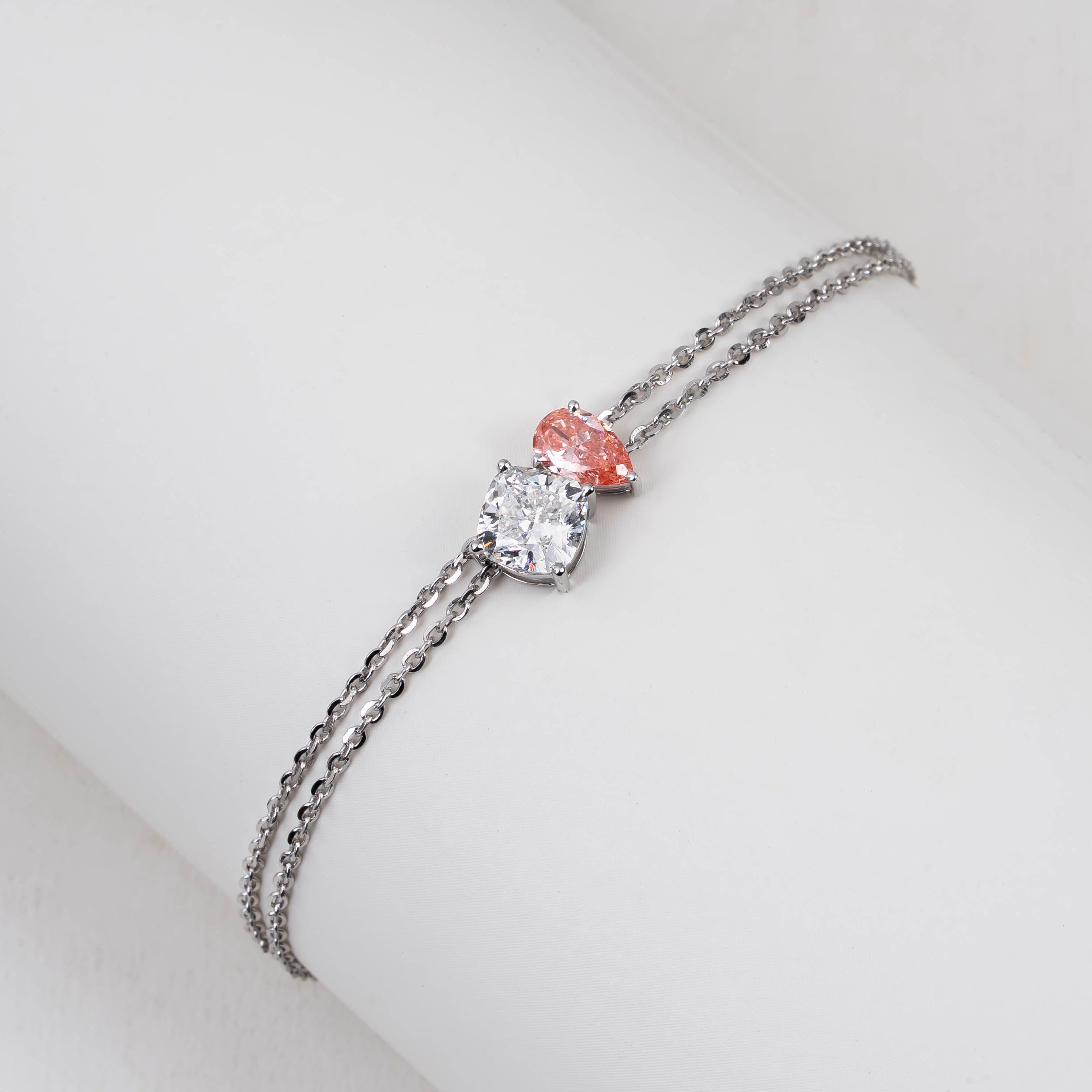 CUSHION WITH PINK PEAR SOLITAIRE DIAMOND DELICATE DOUBLE-STRAND BRACELET