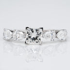 PRINCESS CROWN RING EMBRACED BY PEAR CUT SOLITAIRE LAB GROWN DIAMOND
