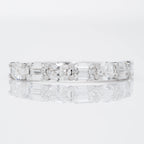 EMERALD CROWN RING EMBRACED BY OVAL CUT SOLITAIRE LAB GROWN DIAMOND