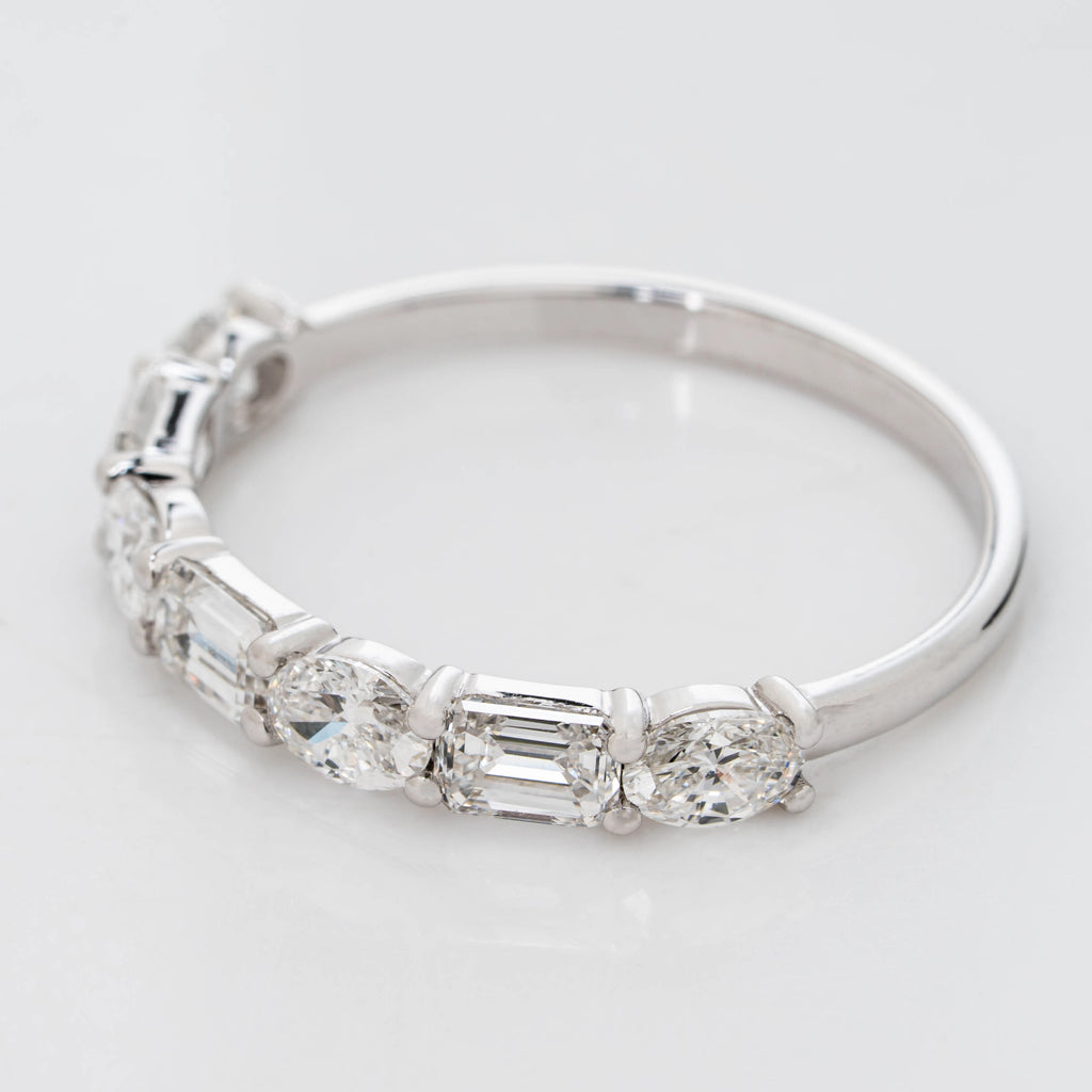 EMERALD CROWN RING EMBRACED BY OVAL CUT SOLITAIRE LAB GROWN DIAMOND
