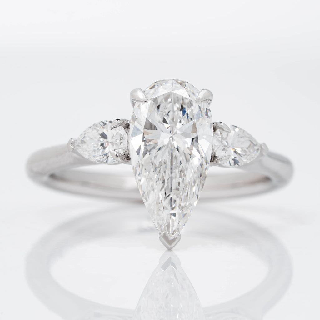 ELONGATED UNIQUE PEAR CUT SOLITAIRE LAB GROWN DIAMOND ENGAGEMENT RING WITH PEAR DIAMOND