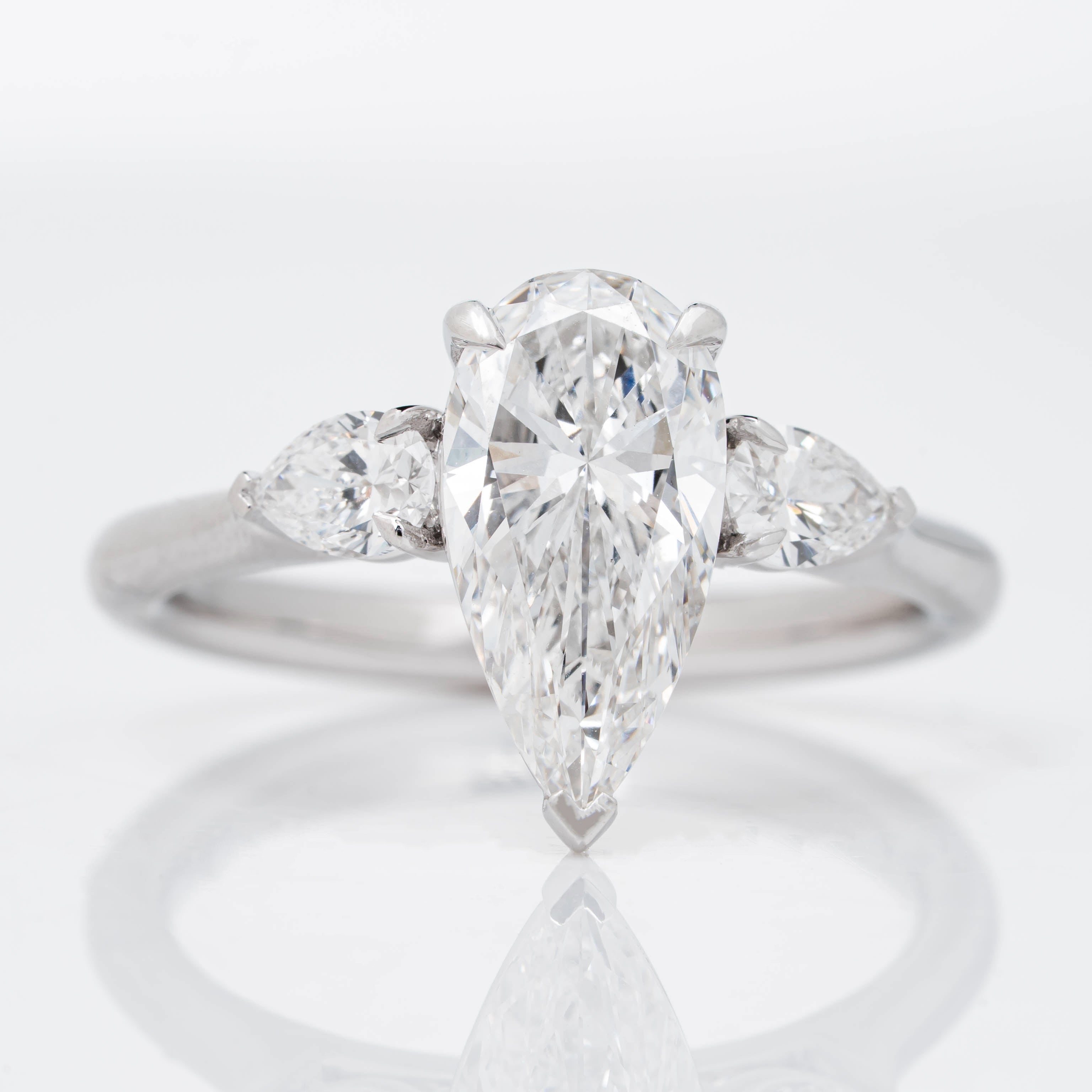 ELONGATED UNIQUE PEAR CUT SOLITAIRE LAB GROWN DIAMOND ENGAGEMENT RING WITH PEAR DIAMOND