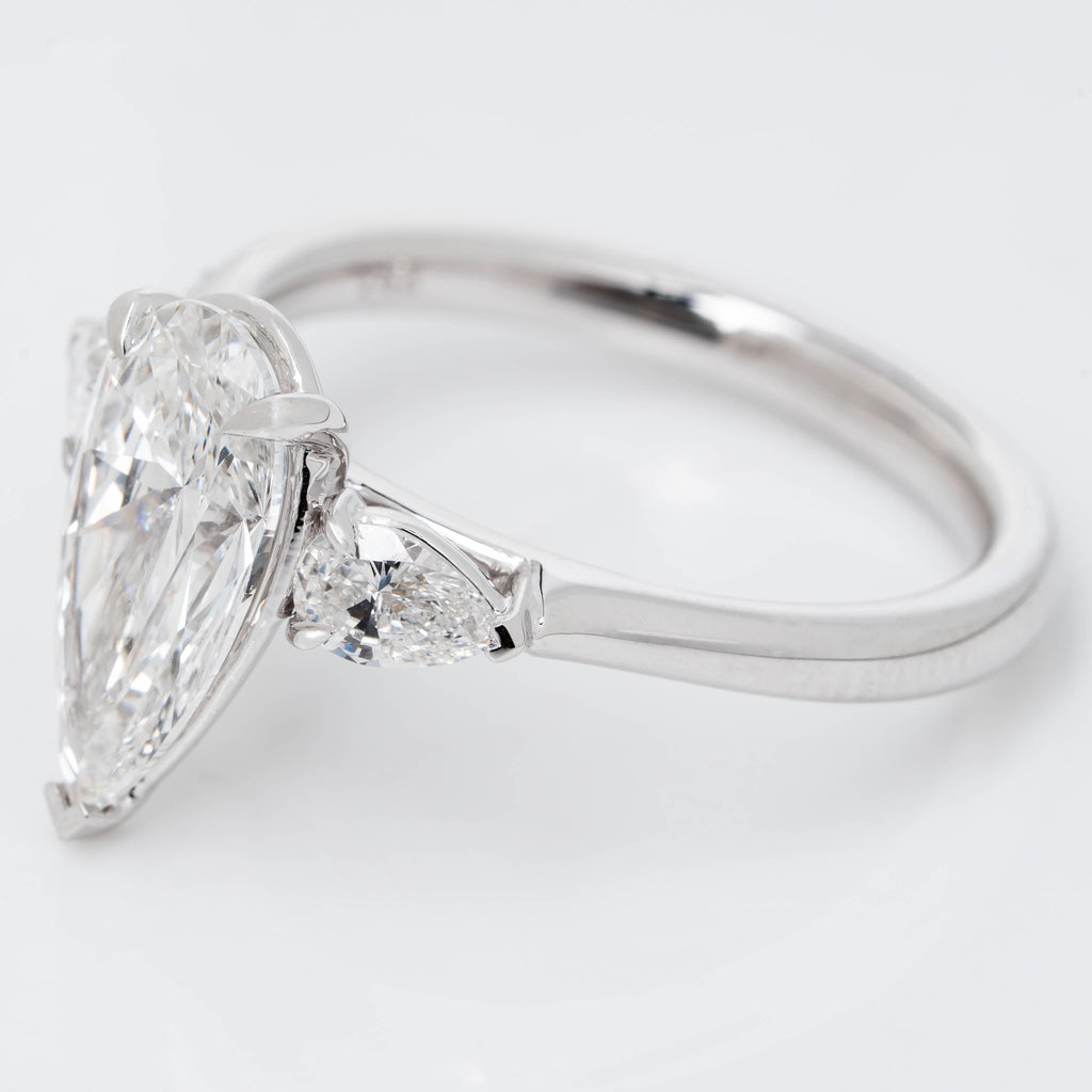 ELONGATED UNIQUE PEAR CUT SOLITAIRE LAB GROWN DIAMOND ENGAGEMENT RING WITH PEAR DIAMOND