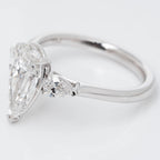 ELONGATED UNIQUE PEAR CUT SOLITAIRE LAB GROWN DIAMOND ENGAGEMENT RING WITH PEAR DIAMOND