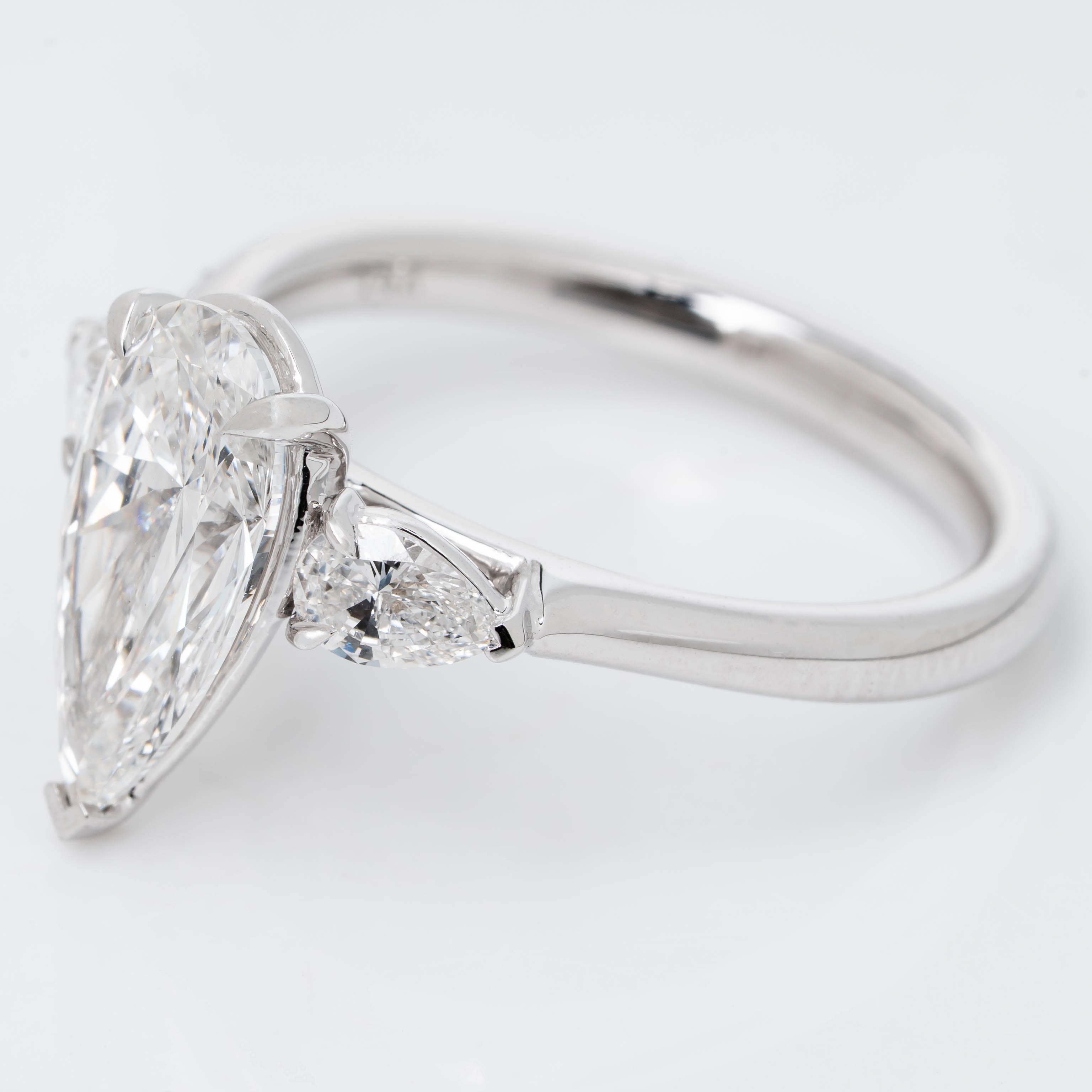 ELONGATED UNIQUE PEAR CUT SOLITAIRE LAB GROWN DIAMOND ENGAGEMENT RING WITH PEAR DIAMOND