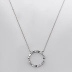 BUGUETTE AND ROUND DIAMOND UNITY CIRCLE PENDENT