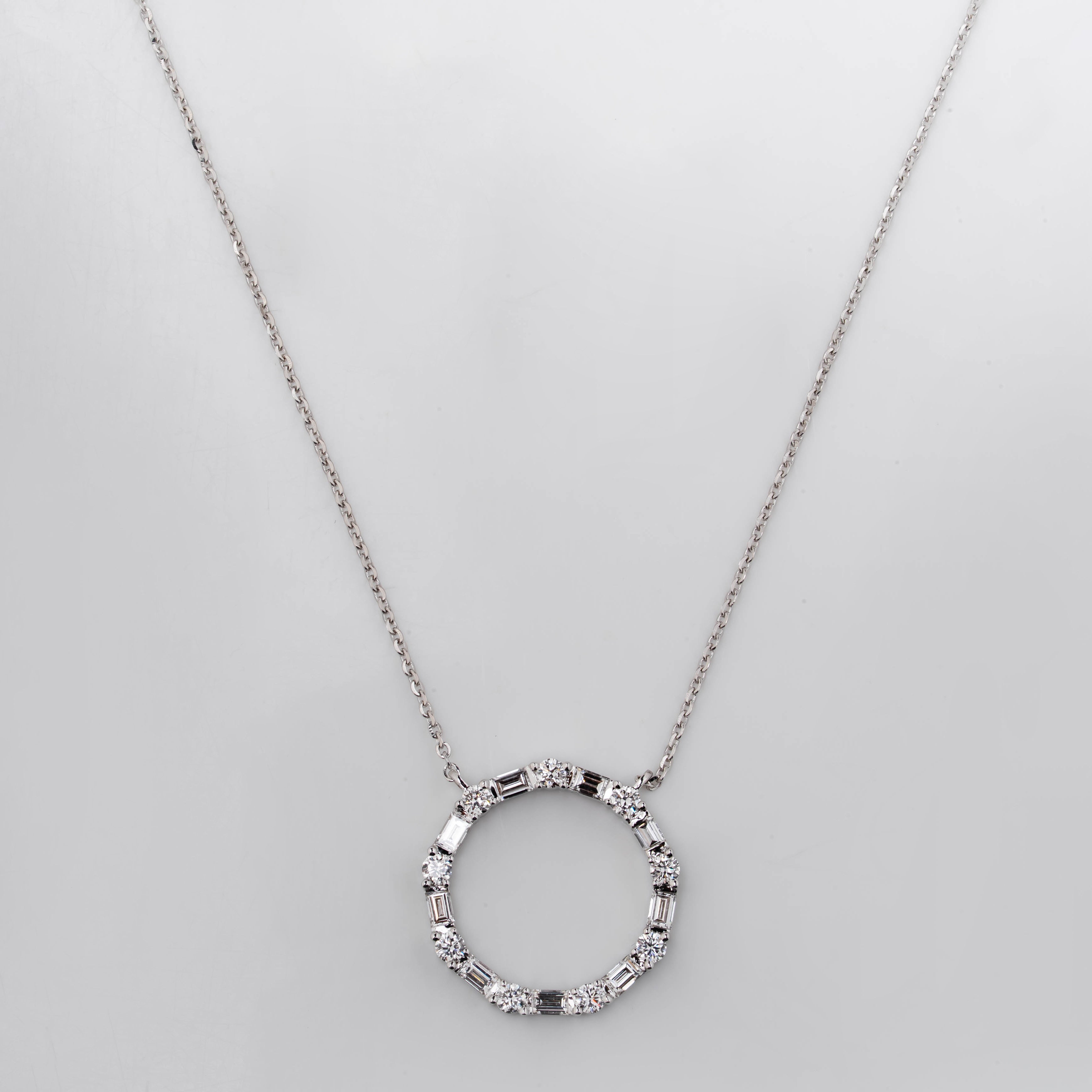 BUGUETTE AND ROUND DIAMOND UNITY CIRCLE PENDENT