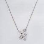 PEAR AND MARQUISE CUT DIAMOND NECKLACE IN VICTORY FLOWER PENDENT
