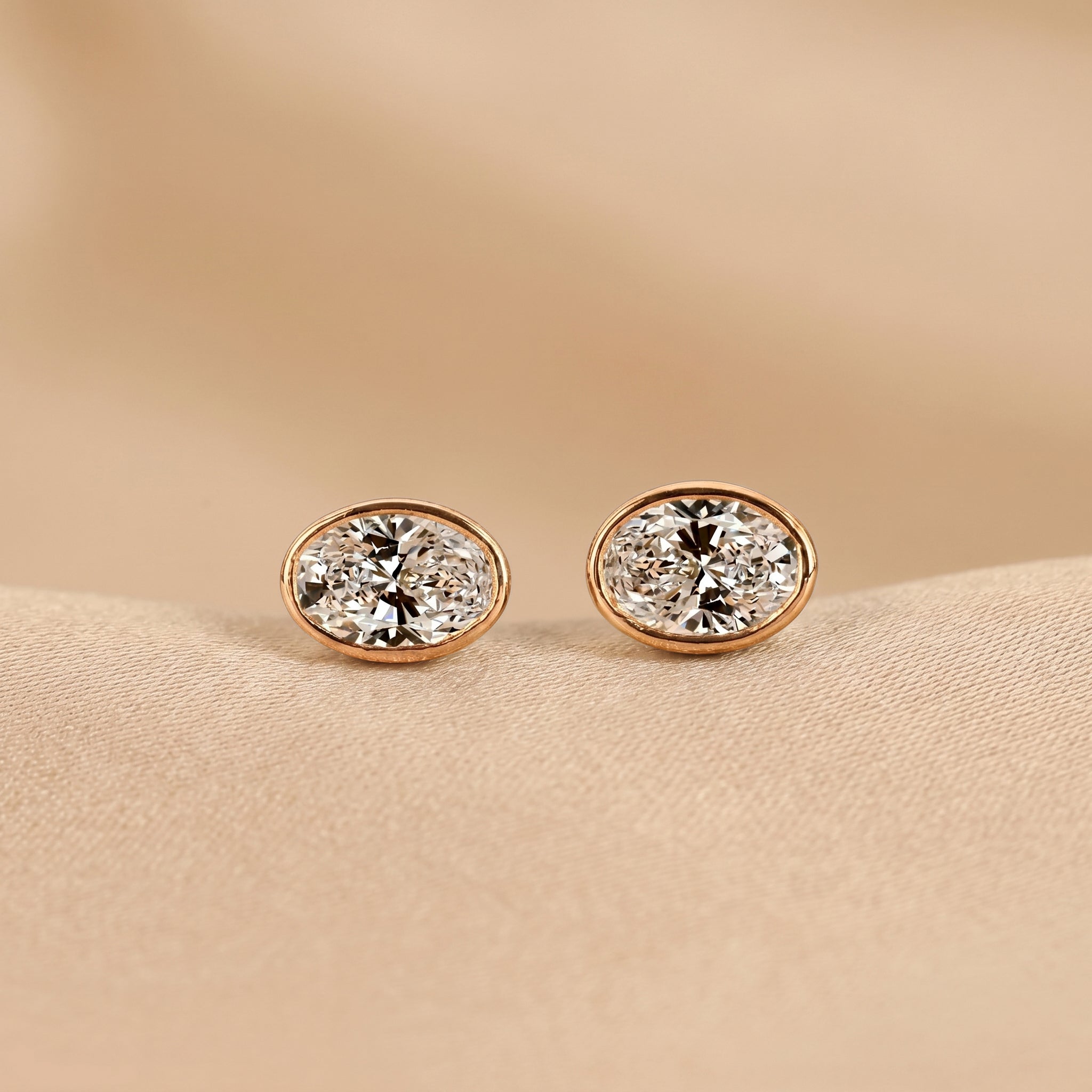 Bezel Set Oval Lab Grown Diamond Stud Earrings in 10K Rose Gold 3 CTW