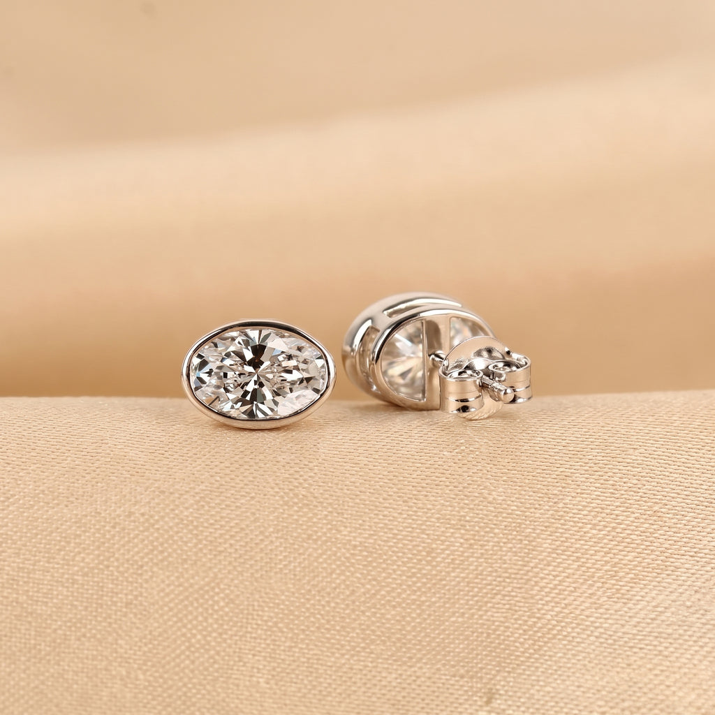 Bezel Set Oval Lab Grown Diamond Stud Earrings in 10K White Gold 3 CTW