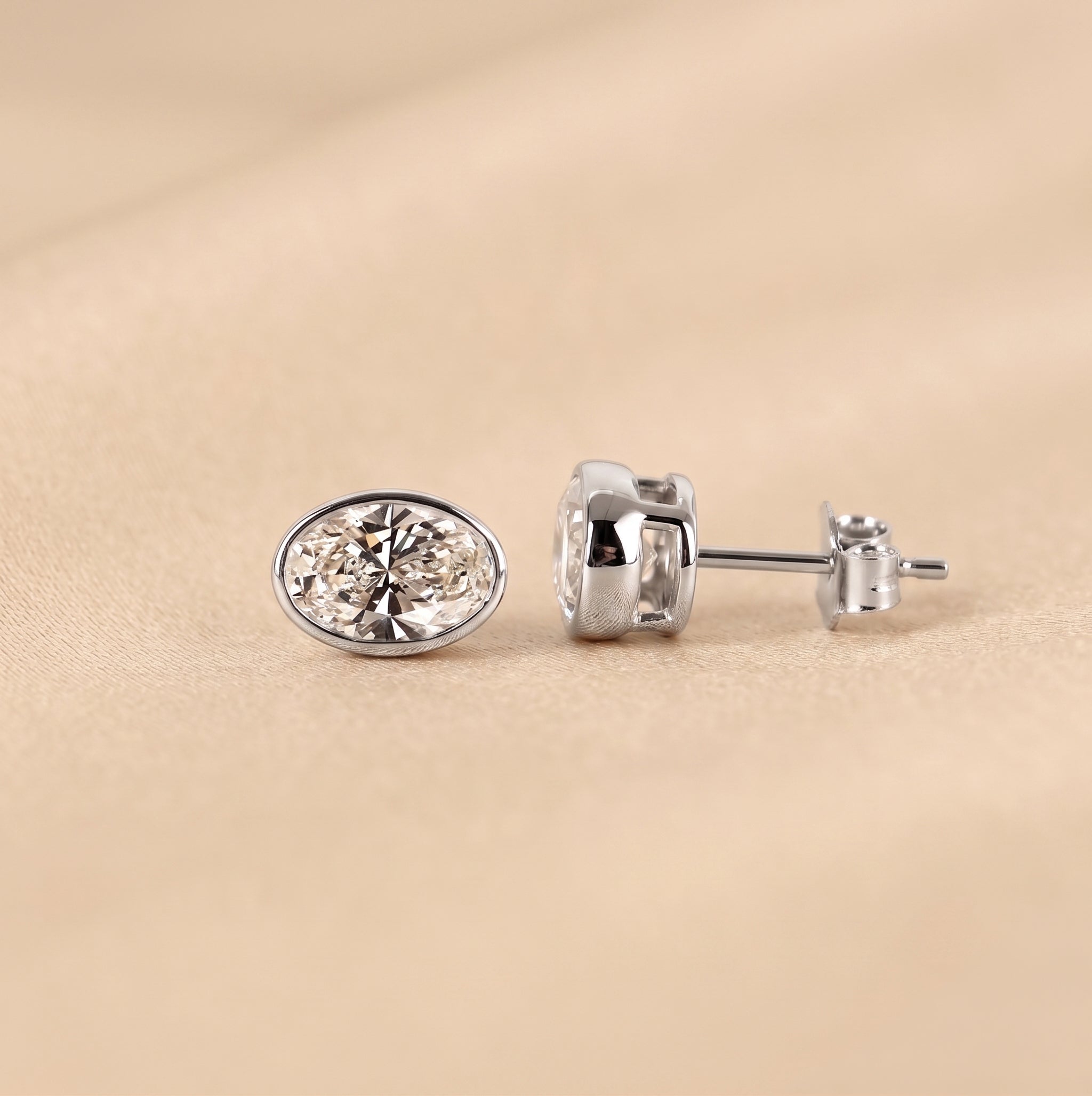 Bezel Set Oval Lab Grown Diamond Stud Earrings in 10K White Gold 3 CTW