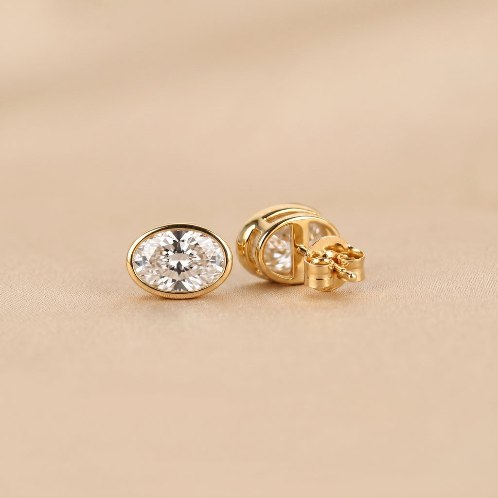 Bezel Set Oval Lab Grown Diamond Stud Earrings in 10K Yellow Gold 3 CTW