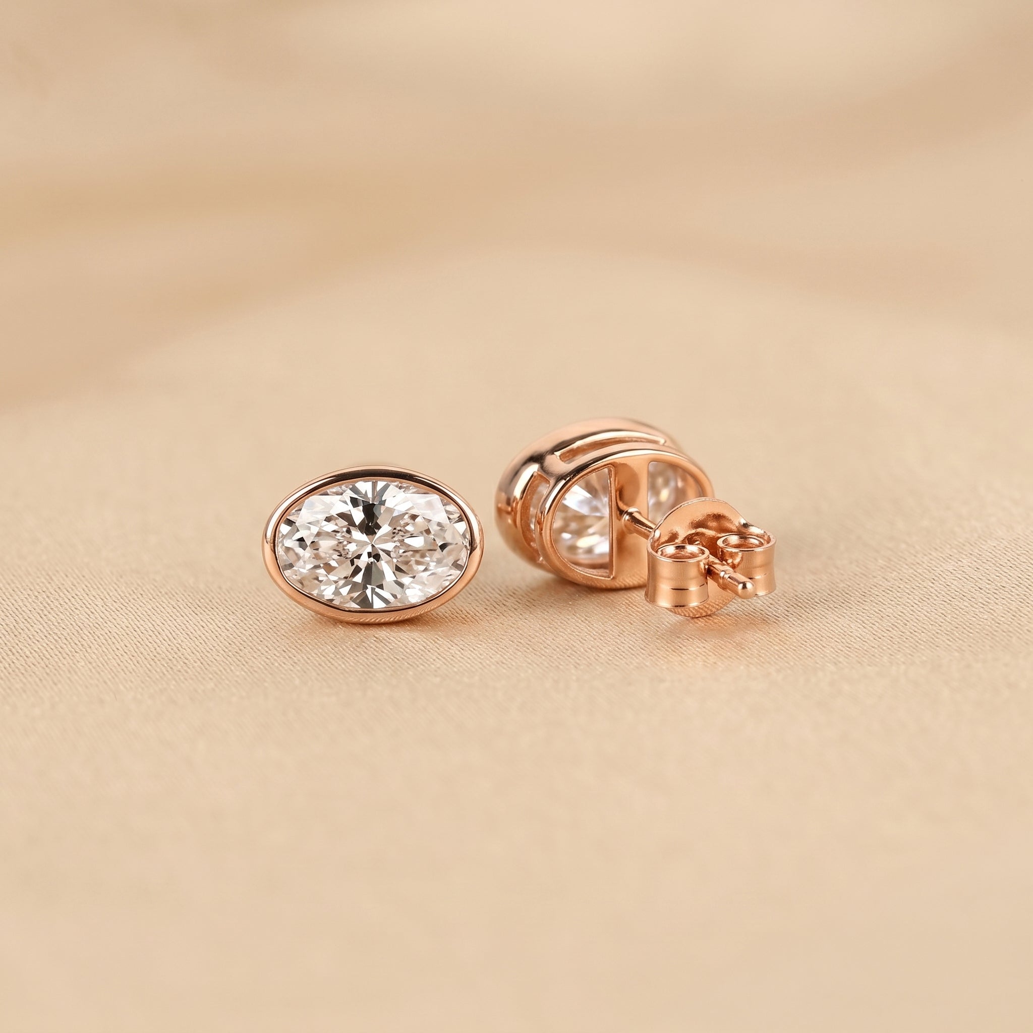 Bezel Set Oval Lab Grown Diamond Stud Earrings in 14K Rose Gold 3 CTW
