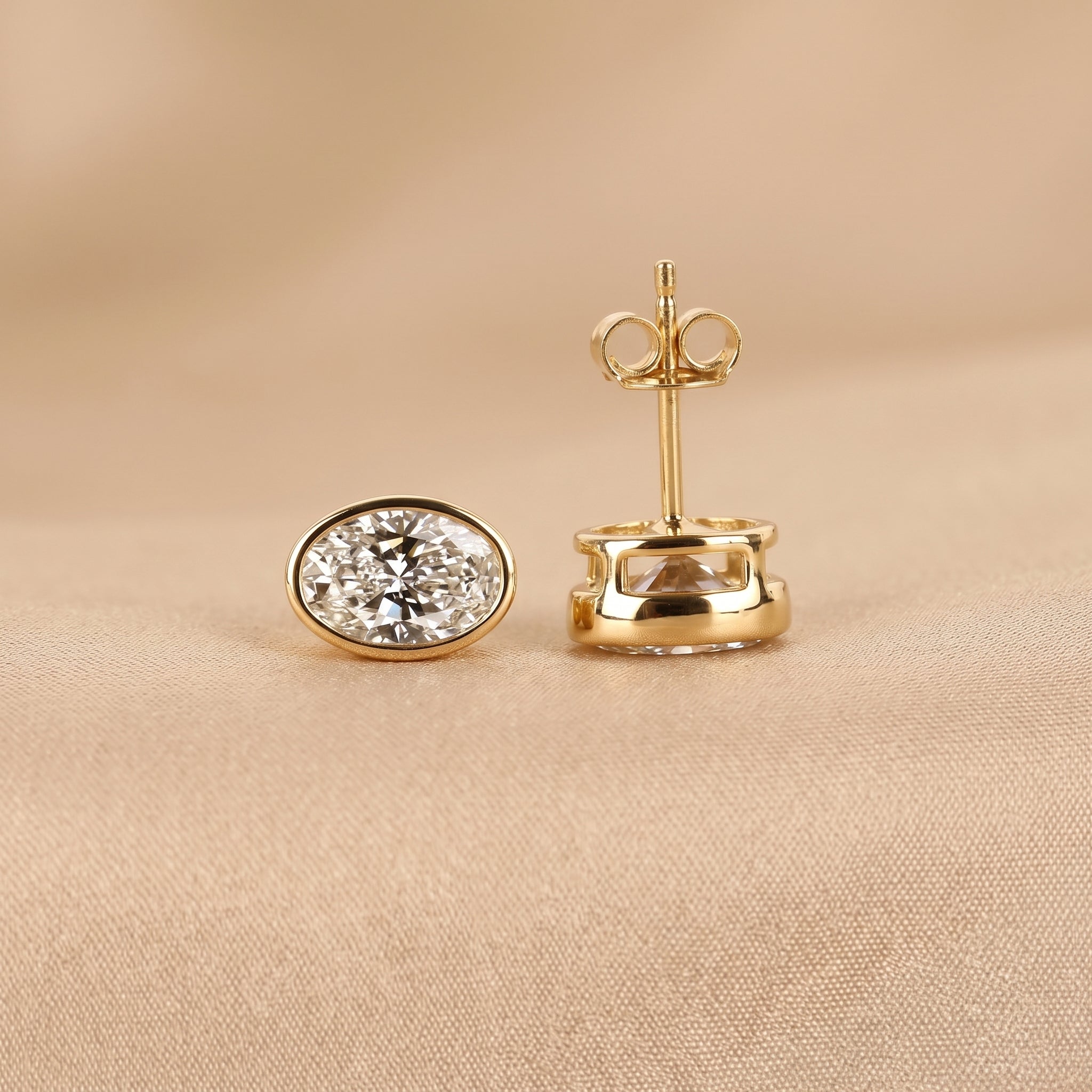 Bezel Set Oval Lab Grown Diamond Stud Earrings in 14K Yellow Gold 3 CTW