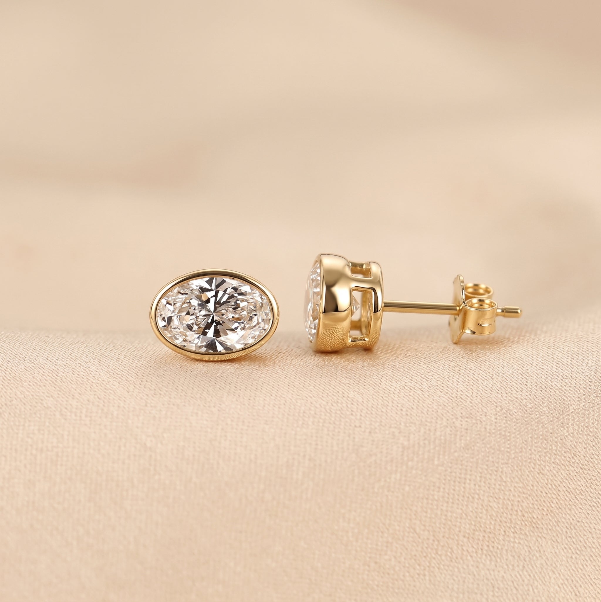 Bezel Set Oval Lab Grown Diamond Stud Earrings in 18K Yellow Gold 3 CTW