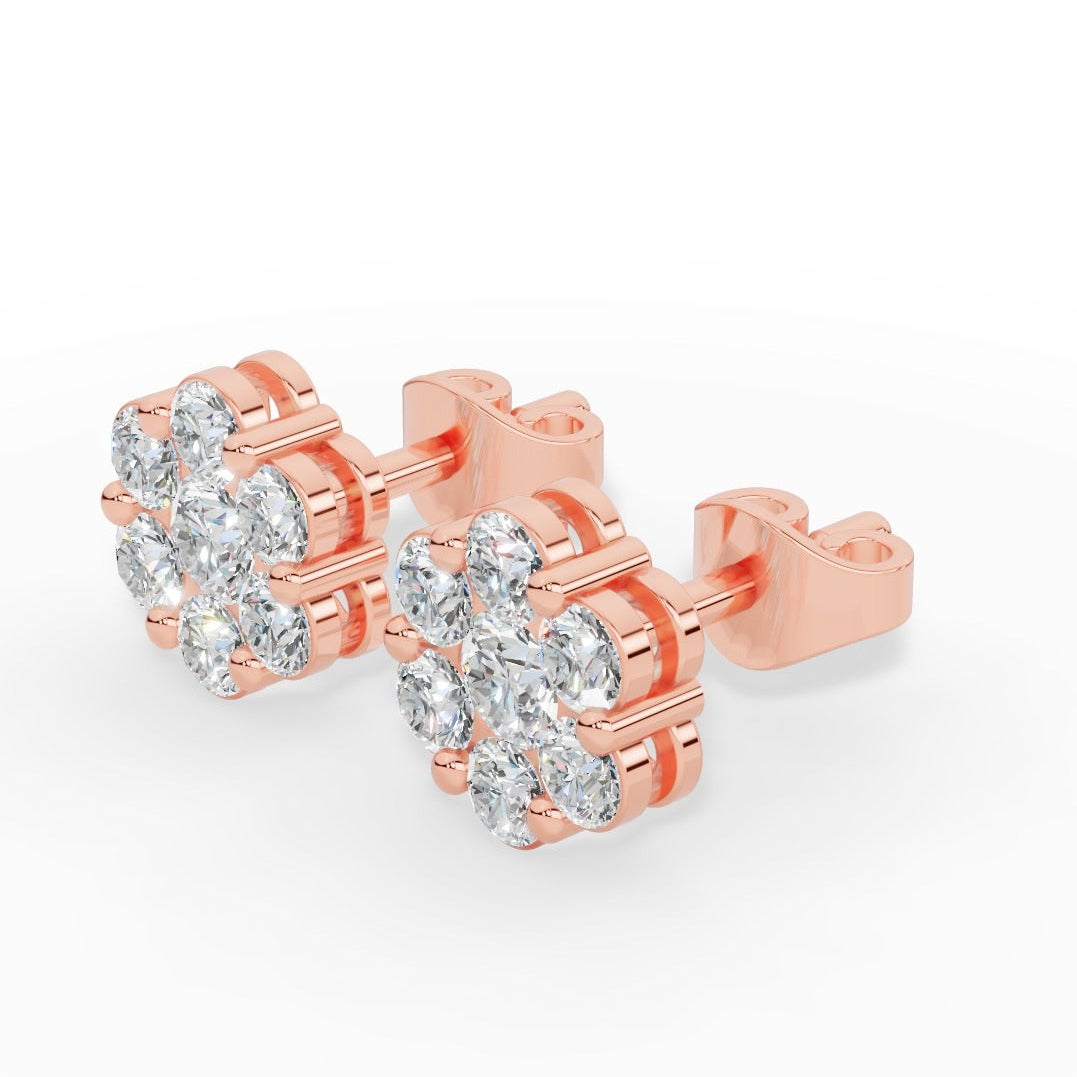 Brilliant round-cut lab grown diamonds form a radiant cluster in these elegant stud earrings, offering exceptional sparkle, ethical craftsmanship, and timeless style for everyday wear or special occasions. 18k rose gold