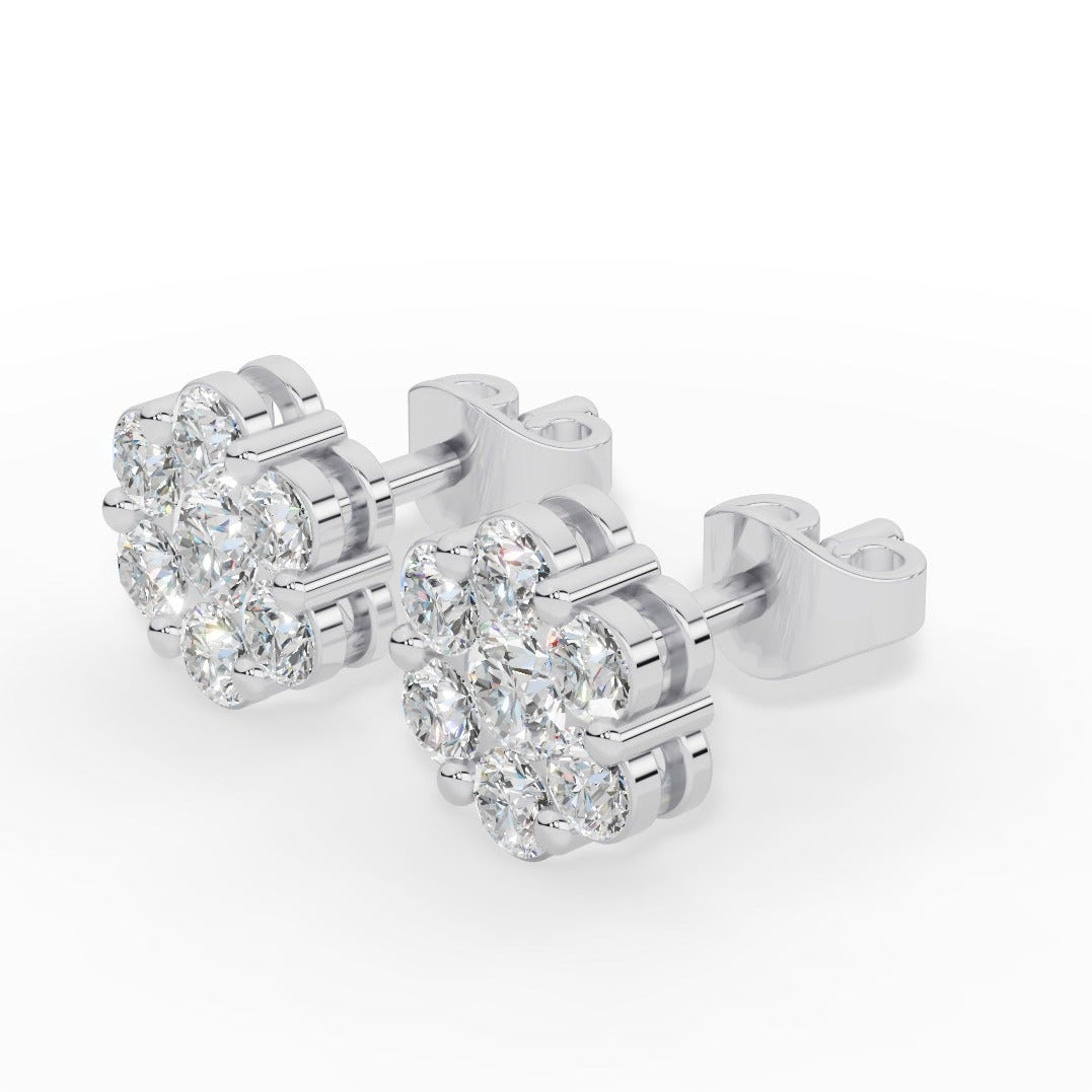 Brilliant round-cut lab grown diamonds form a radiant cluster in these elegant stud earrings, offering exceptional sparkle, ethical craftsmanship, and timeless style for everyday wear or special occasions. 18k white gold
