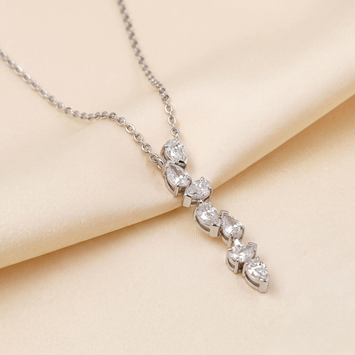 Cascading Pear Drop Pendant With Stunning Pear Cut With Chain 10K White Gold 0.6 CTW