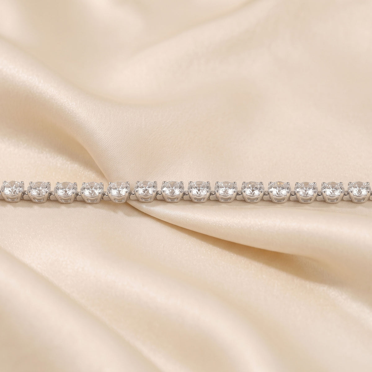 Elongated Four Prong Round Tennis Bracelet Lab Grown Diamonds 18K White Gold 16 CTW