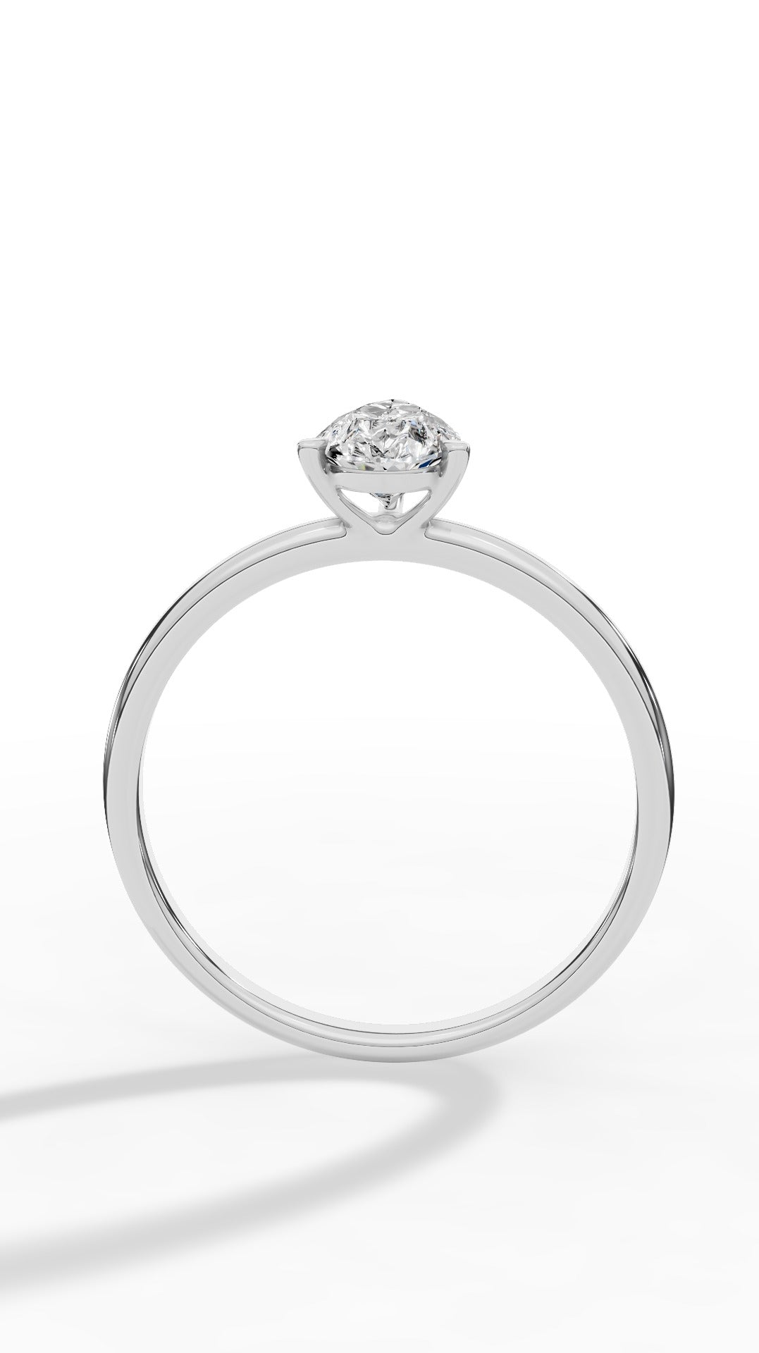 Elongated Three Prong Pear Cut Solitaire 10K White Gold 0.6 CTW