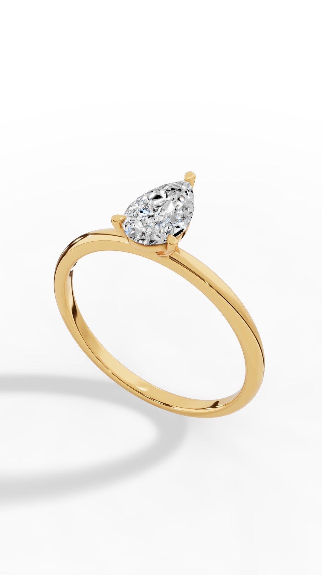 Elongated Three Prong Pear Cut Solitaire 10K Yellow Gold 0.6 CTW