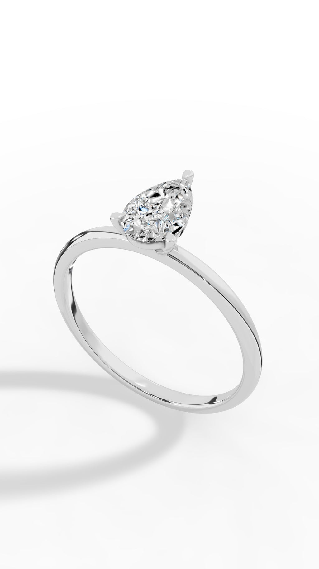 Elongated Three Prong Pear Cut Solitaire 18K White Gold 0.6 CTW