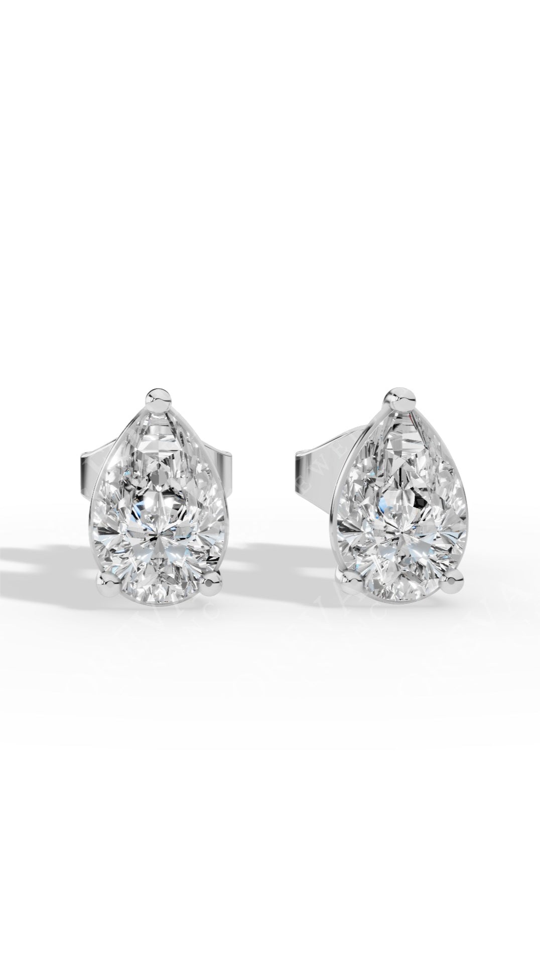 Elongated Three Prong Pear Cut Solitaire Stud Earrings 18K White Gold 0.7 CTW