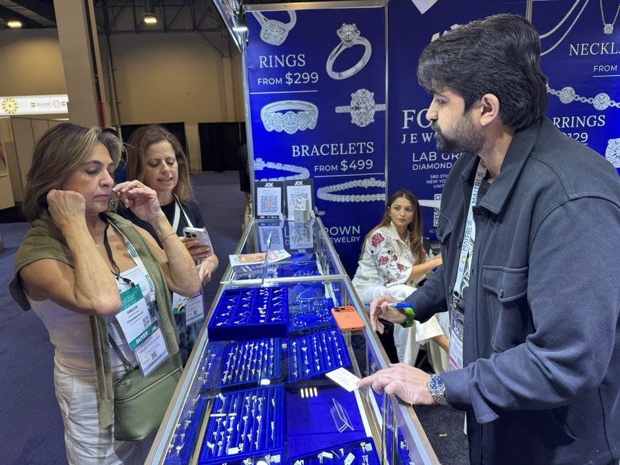 Buyers trying on lab-grown diamond jewellery at the Foreva Jewels counter during JCK Las Vegas 2026