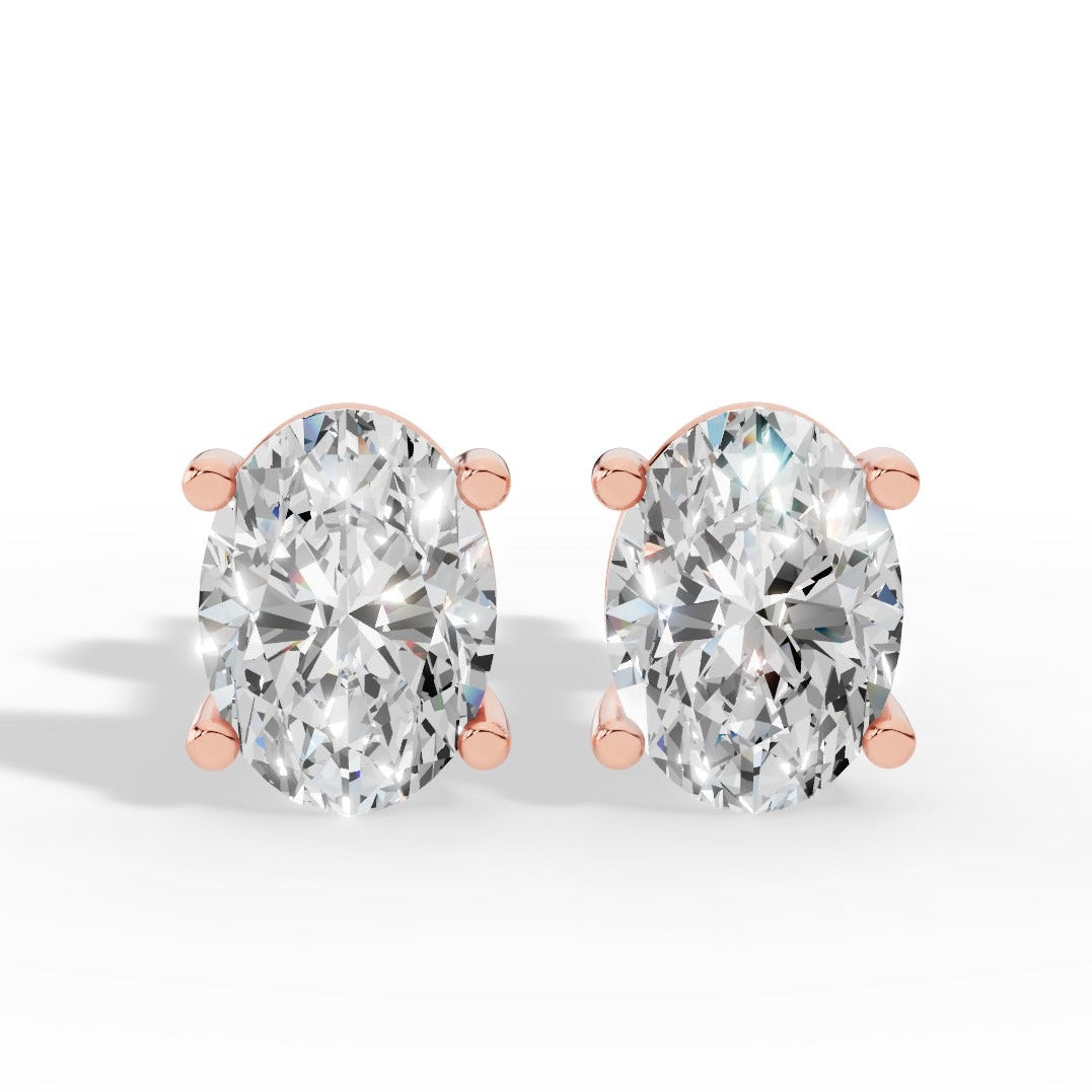 Oval Cut Four Prong Solitaire Lab Grown Diamond Stud Earrings 14k rose gold