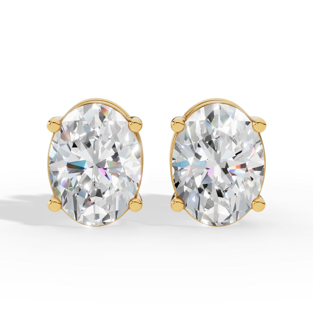 Oval Cut Solitaire Lab-Grown Diamond Stud Earrings yellow gold