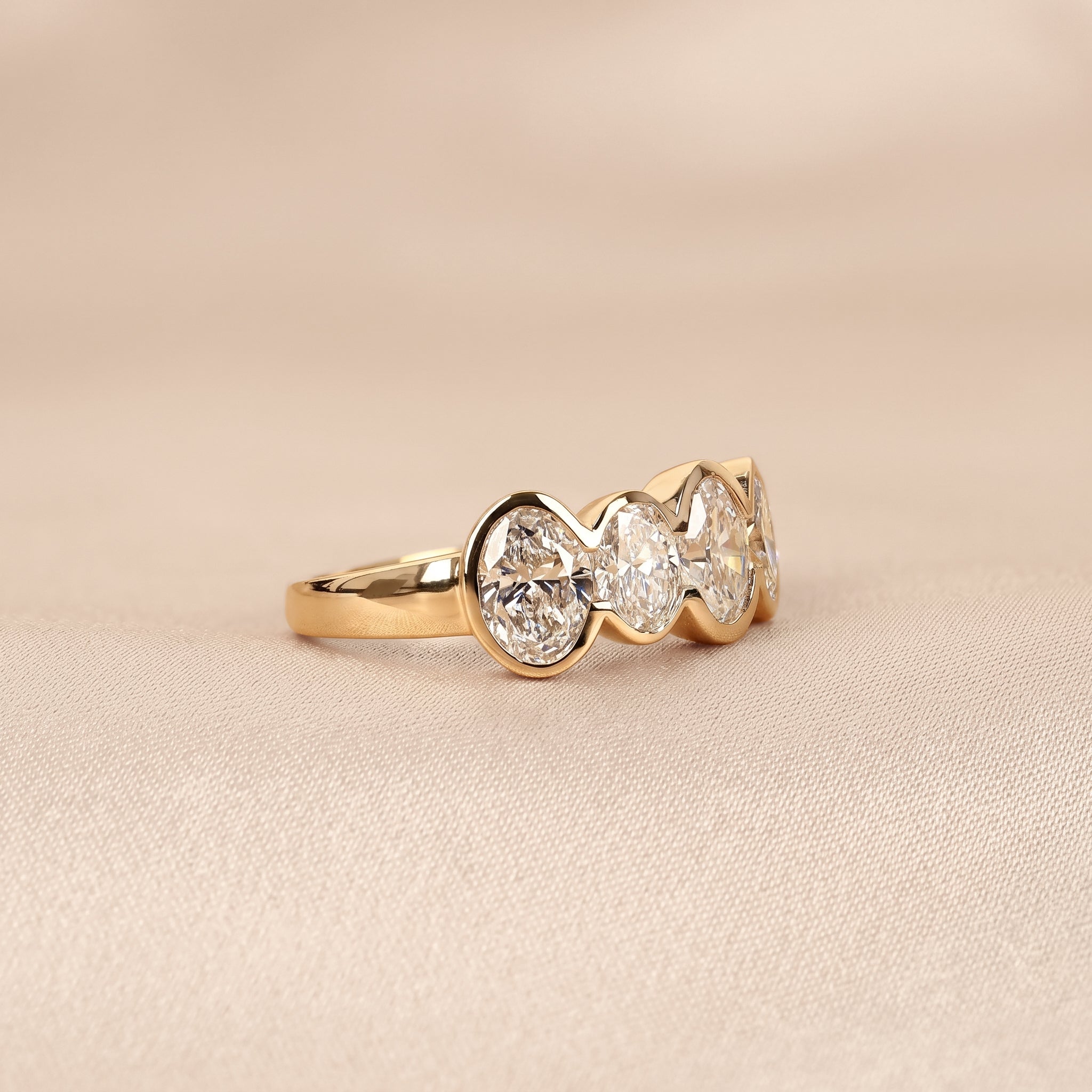 Oval Lab Grown Diamond Bezel Band in 10K Yellow Gold 3.35 CTW