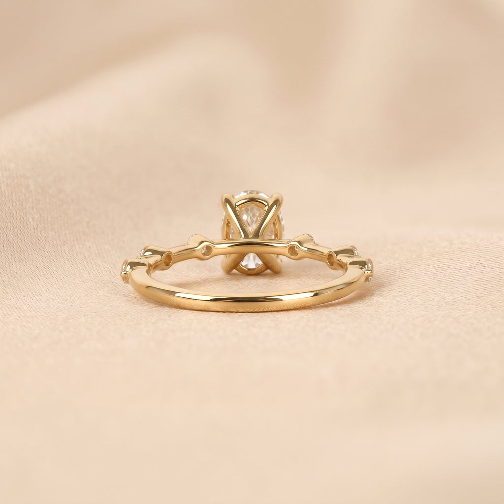 Oval Lab Grown Diamond Ring with Round Accents in 10K Yellow Gold 2.70 CTW