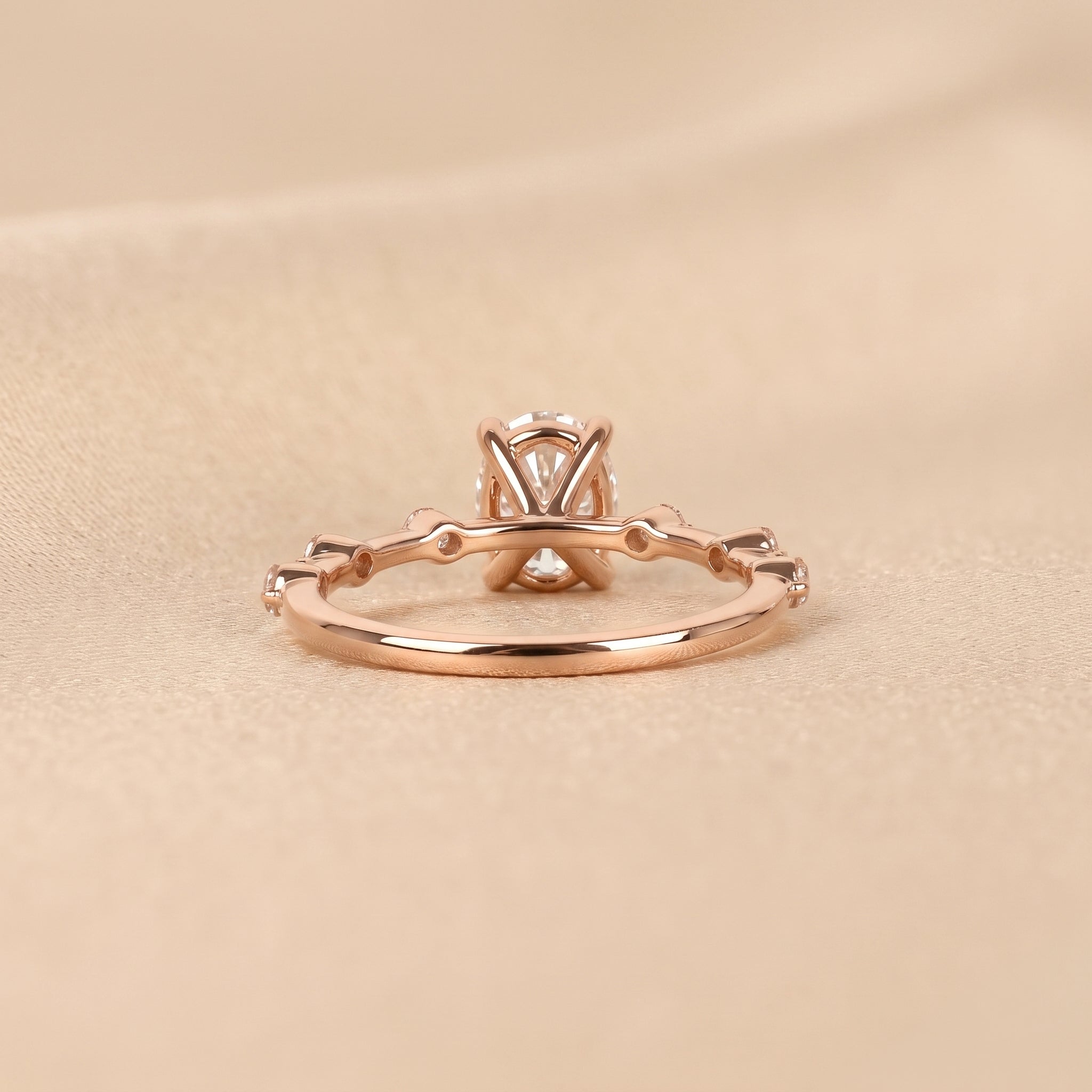 Oval Lab Grown Diamond Ring with Round Accents in 18K Rose Gold 2.70 CTW