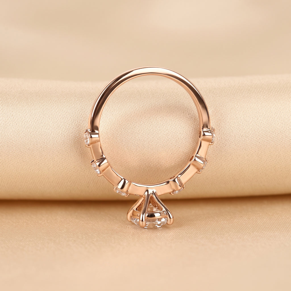 Oval Lab Grown Diamond Ring with Round Accents in 18K Rose Gold 2.70 CTW