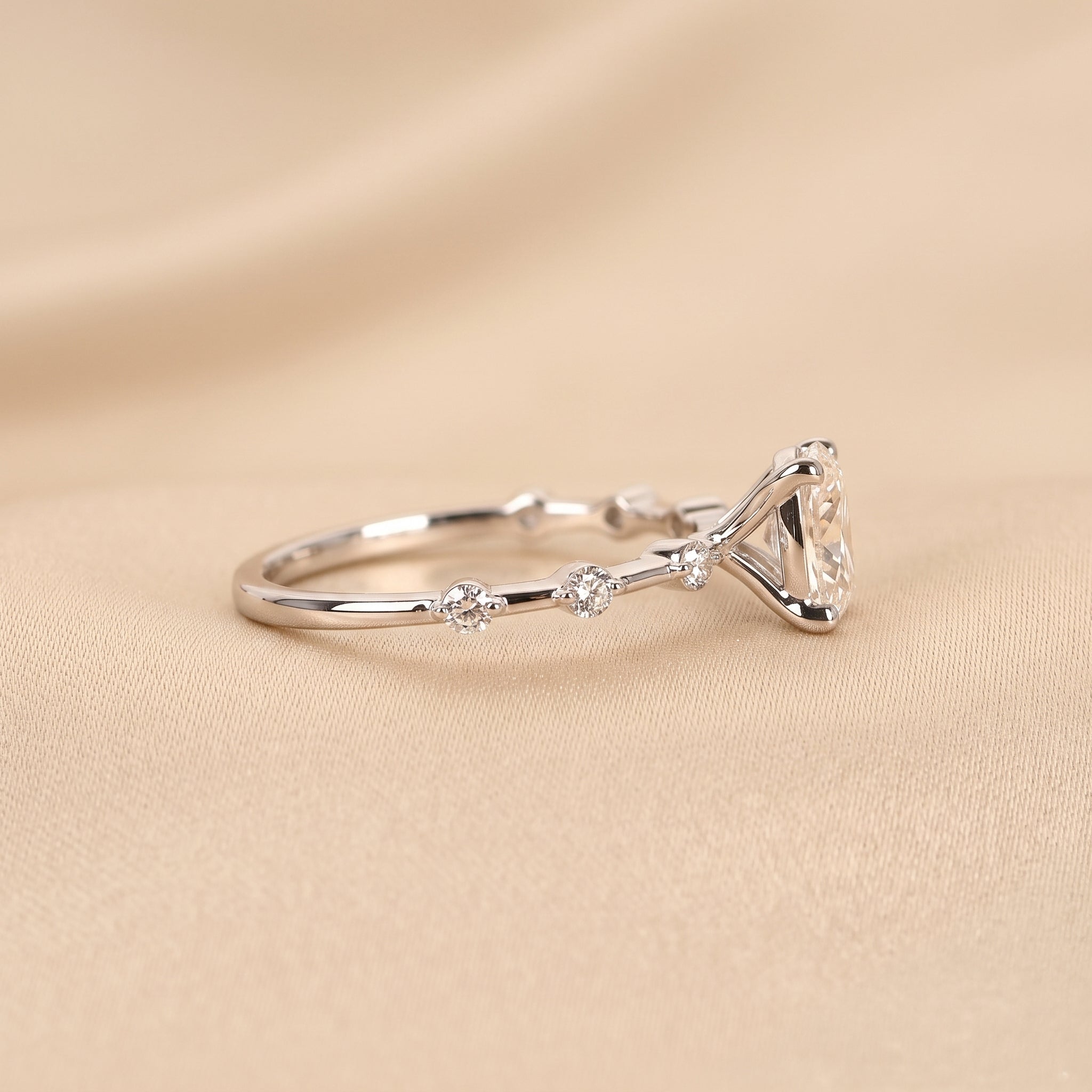 Oval Lab Grown Diamond Ring with Round Accents in 18K White Gold 2.70 CTW