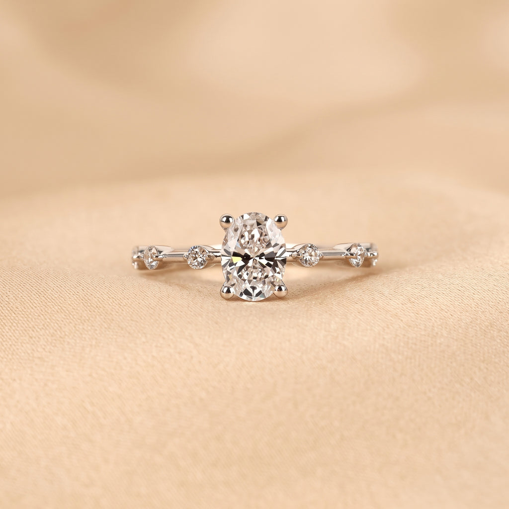 Oval Lab Grown Diamond Ring with Round Accents in 18K White Gold 2.70 CTW