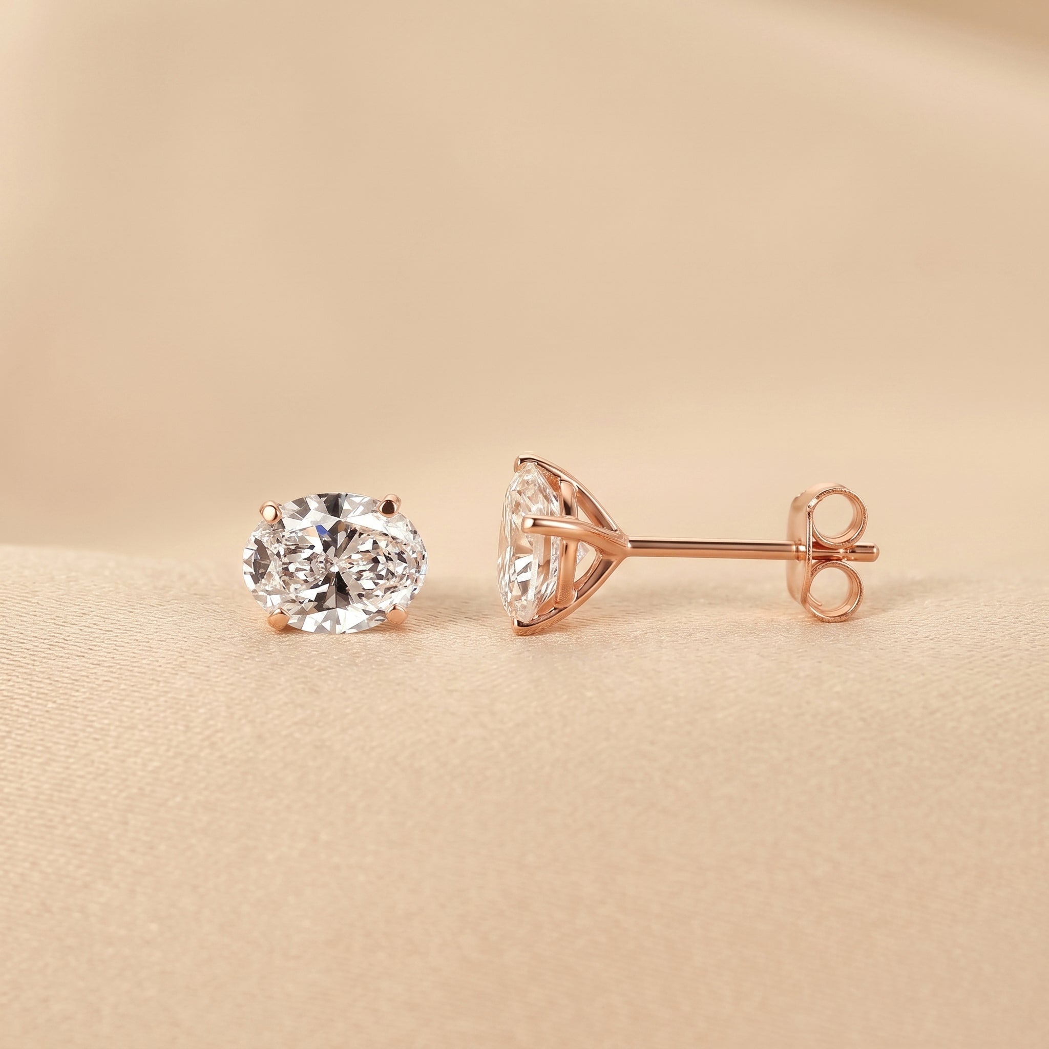 Oval Lab Grown Diamond Stud Earrings in 18K Rose Gold 3 CTW