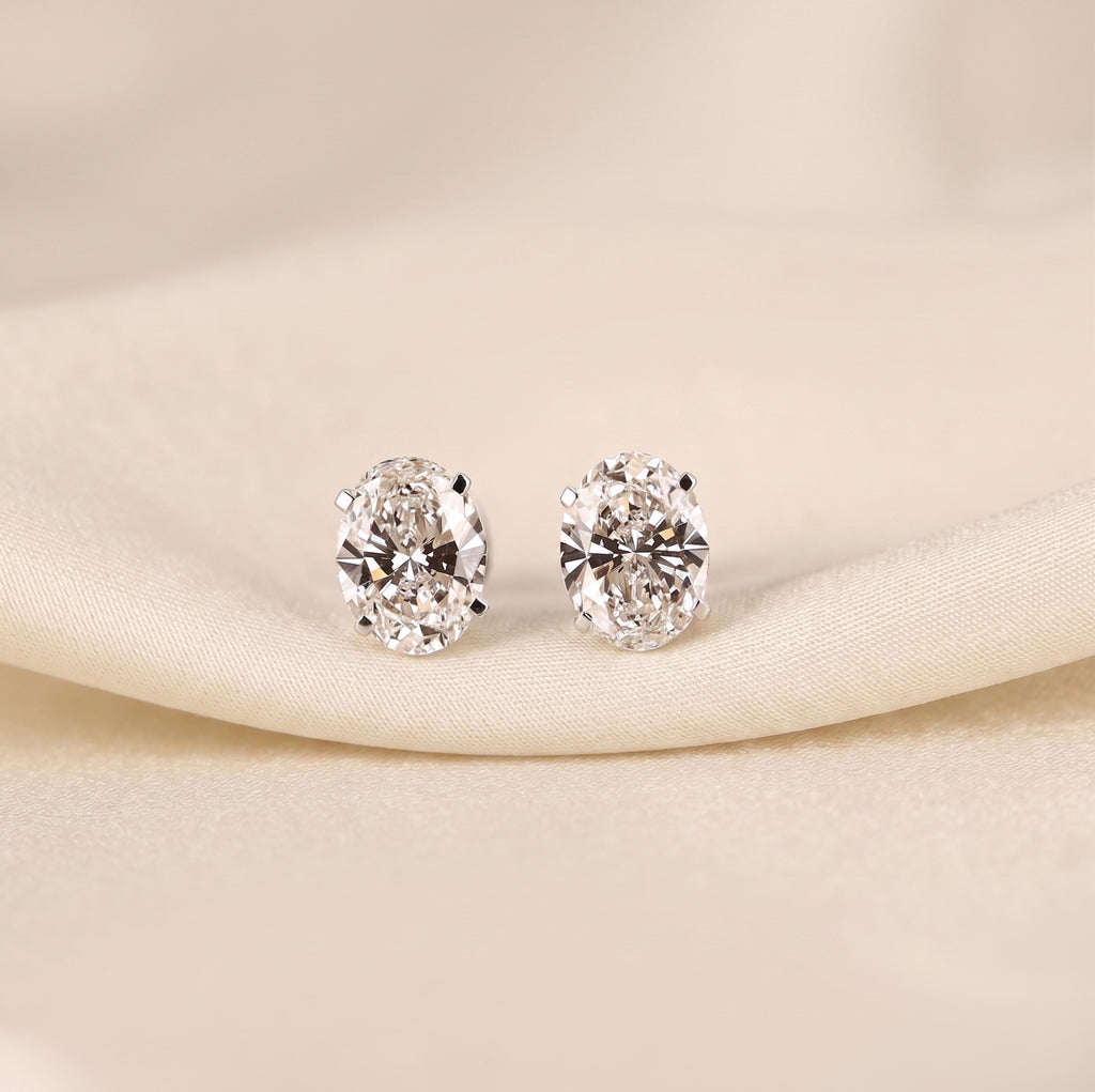 Oval Lab Grown Diamond Stud Earrings in 18K White Gold 3 CTW