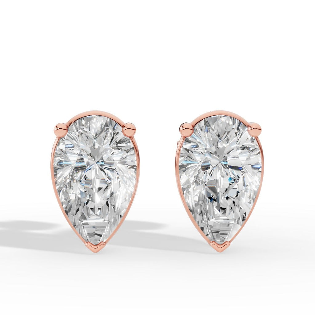 Pear  Cut Three Prong  Solitaire Lab-Grown Diamond Stud Earrings 14k Rose Gold