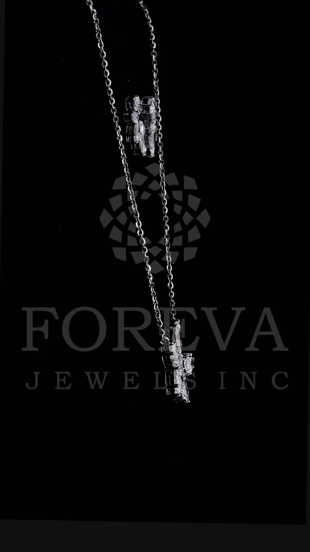 PEAR AND MARQUISE CUT DIAMOND NECKLACE IN VICTORY FLOWER PENDENT