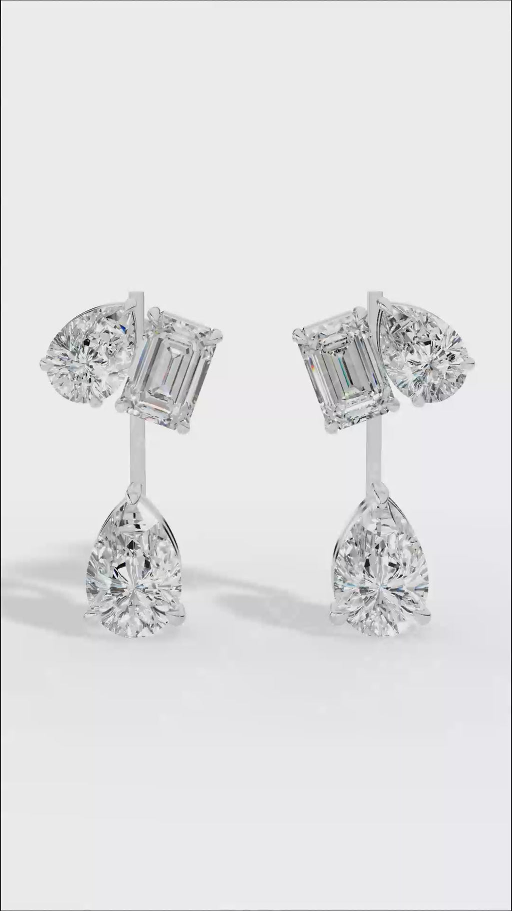 Multi Stone Cascade Duet Earrings With Emerald And Pear Cut Lab Grown Diamonds