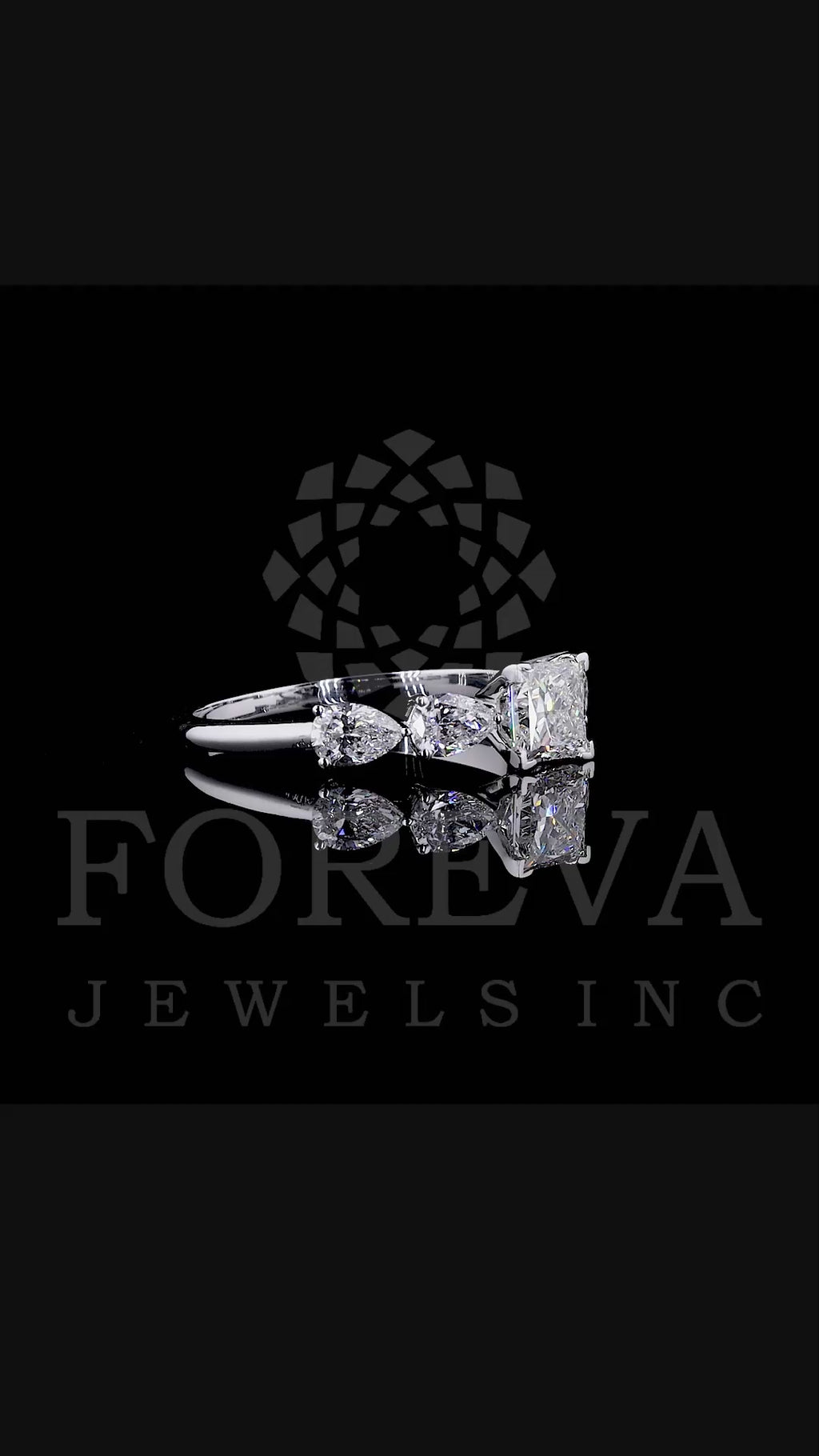 PRINCESS CROWN RING EMBRACED BY PEAR CUT SOLITAIRE LAB GROWN DIAMOND